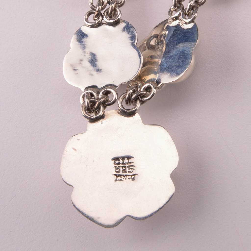 Assortment of Silver Tone Fashion Jewelry