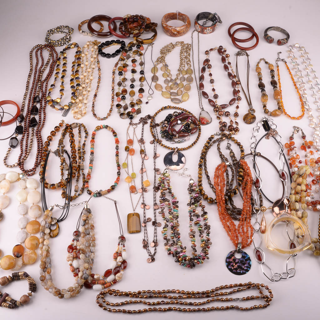 Collection of Red, Orange, and Brown Beaded Fashion Jewelry