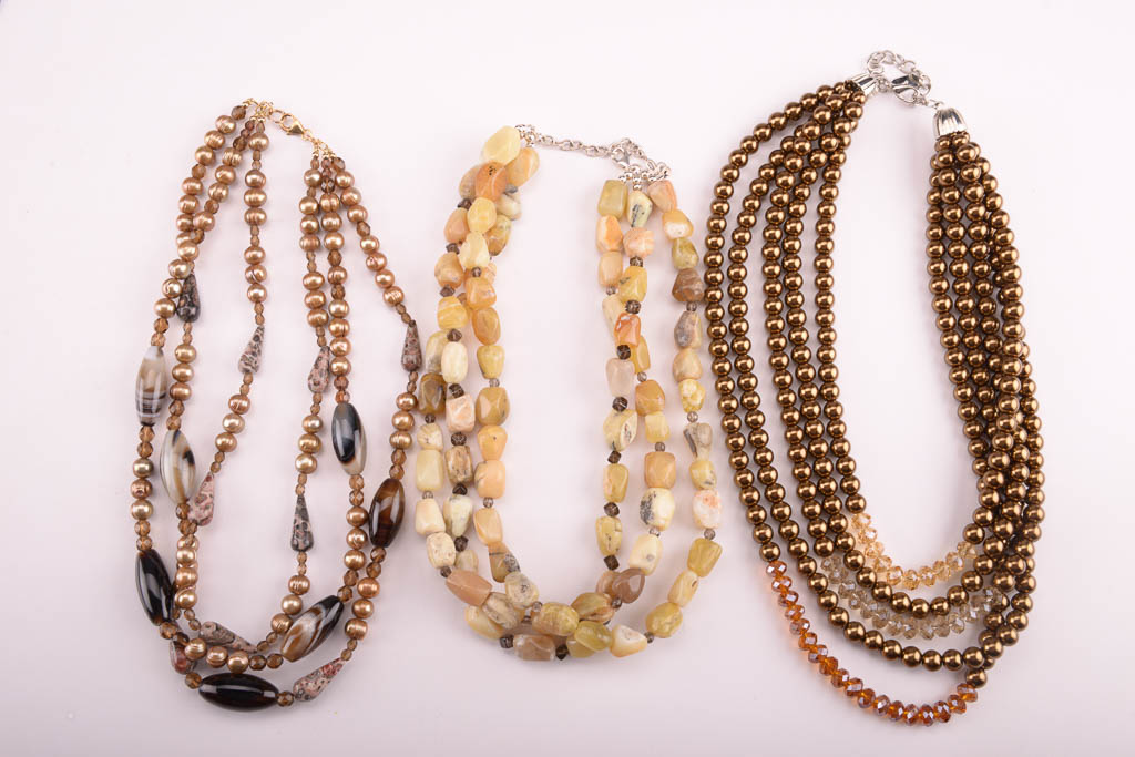 Collection of Red, Orange, and Brown Beaded Fashion Jewelry