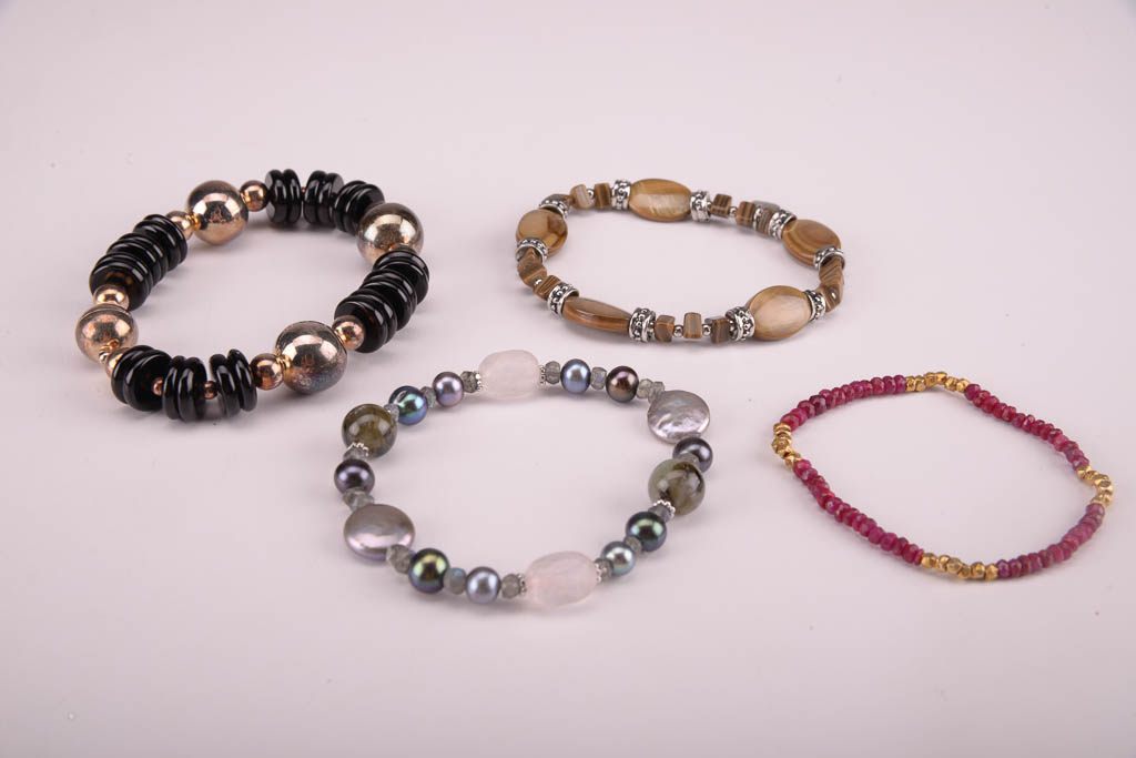 Collection of Red, Orange, and Brown Beaded Fashion Jewelry