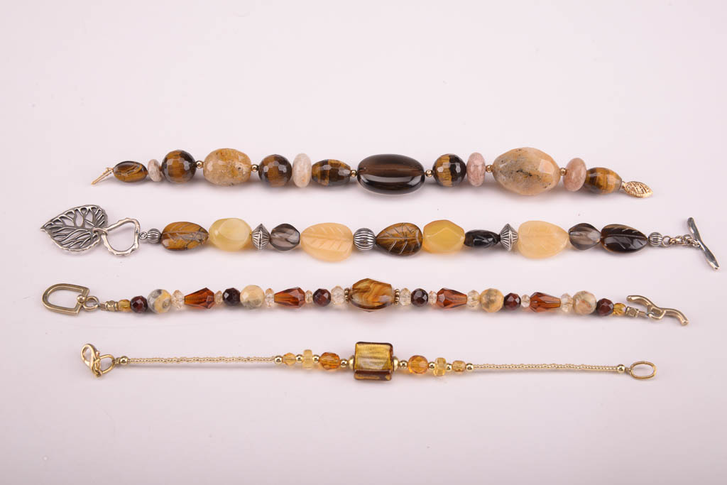 Collection of Red, Orange, and Brown Beaded Fashion Jewelry