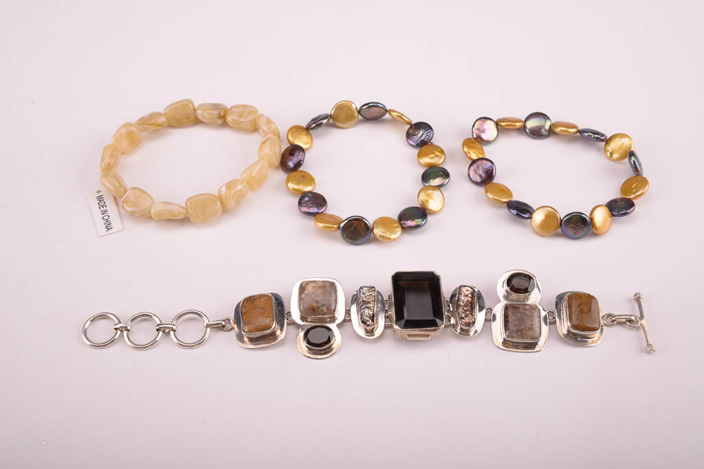 Collection of Red, Orange, and Brown Beaded Fashion Jewelry