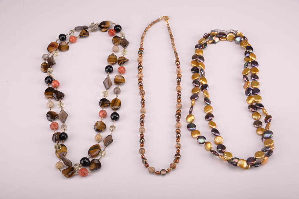 Collection of Red, Orange, and Brown Beaded Fashion Jewelry