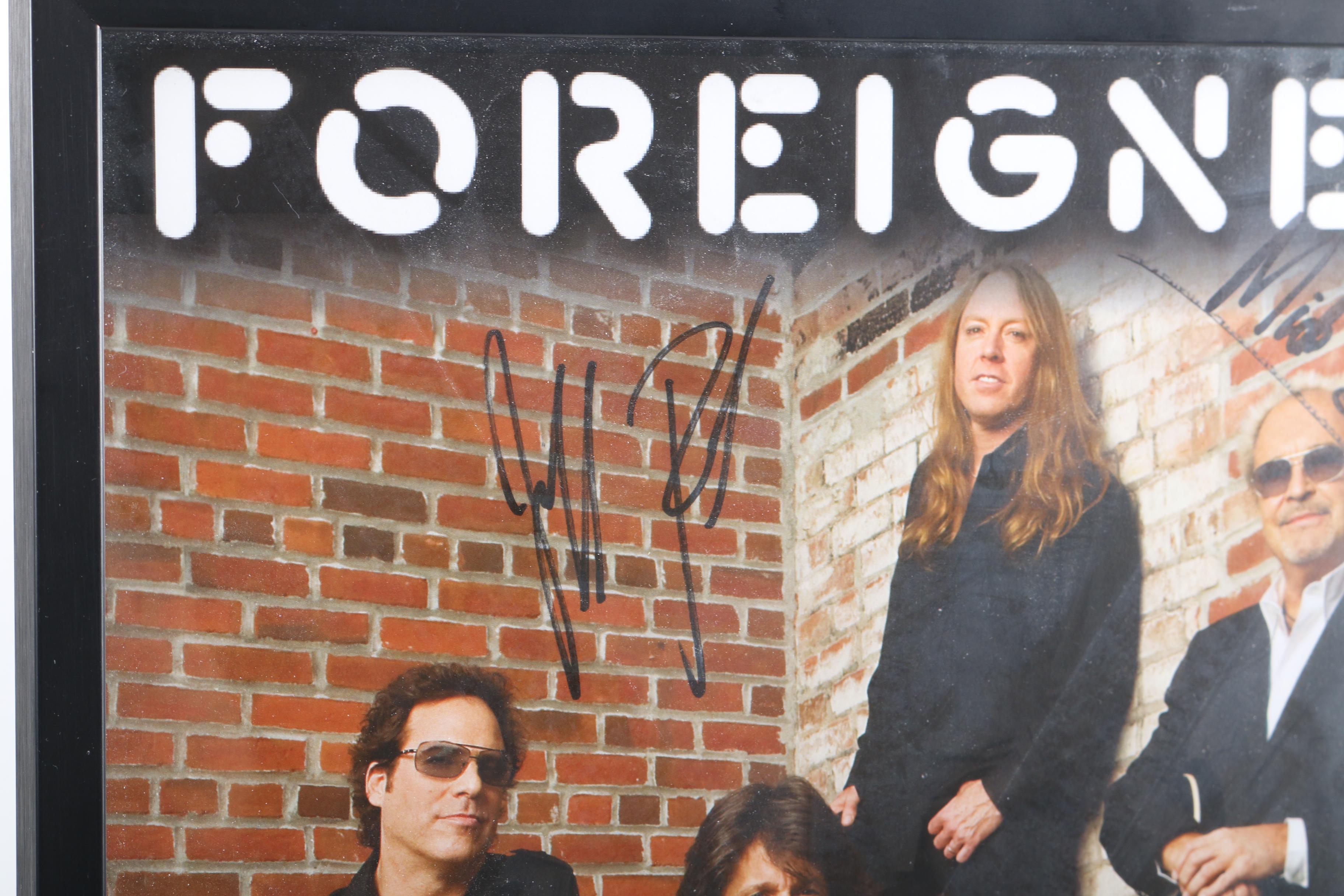 Signed Foreigner Poster and Bruce Hornsby Record