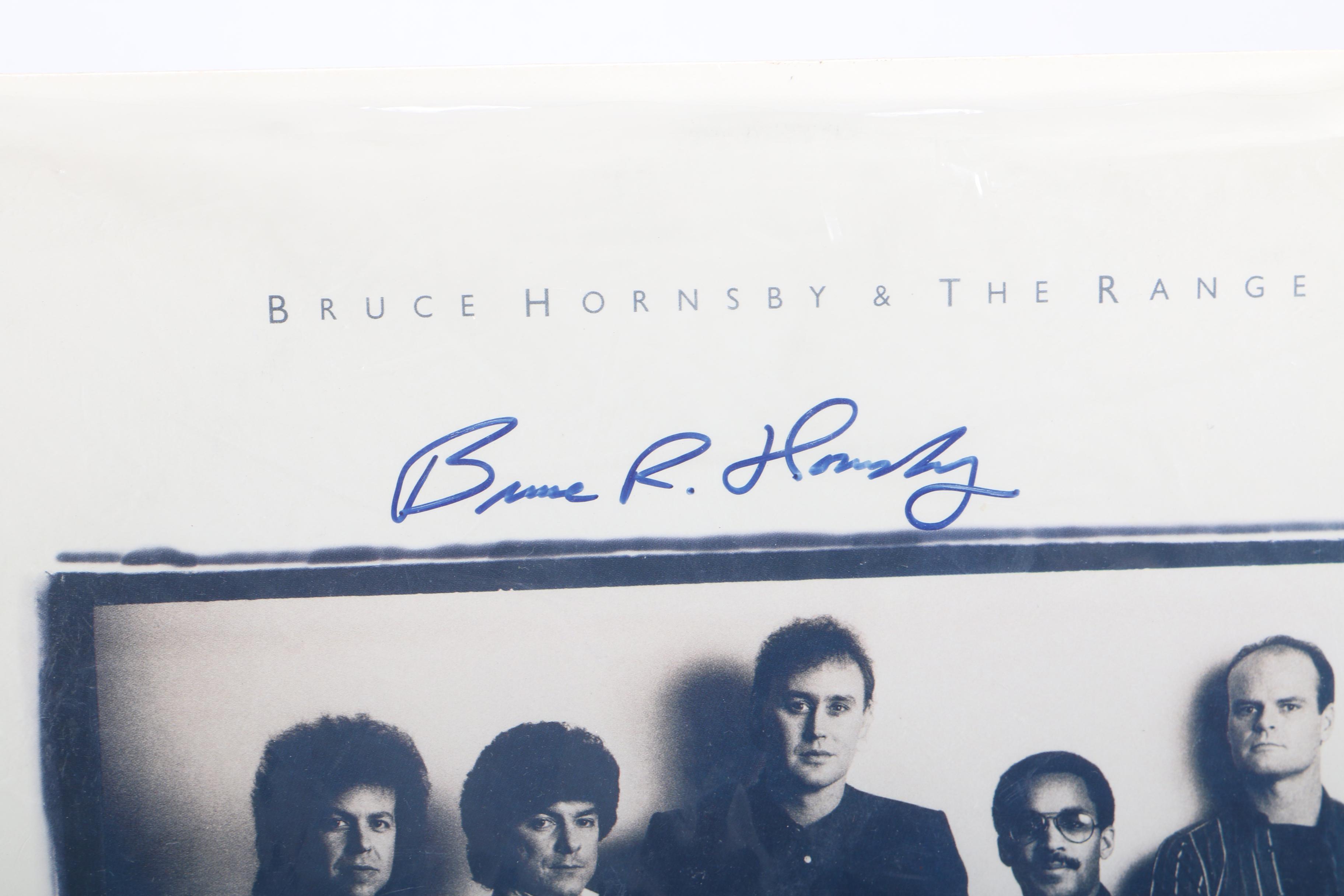 Signed Foreigner Poster and Bruce Hornsby Record