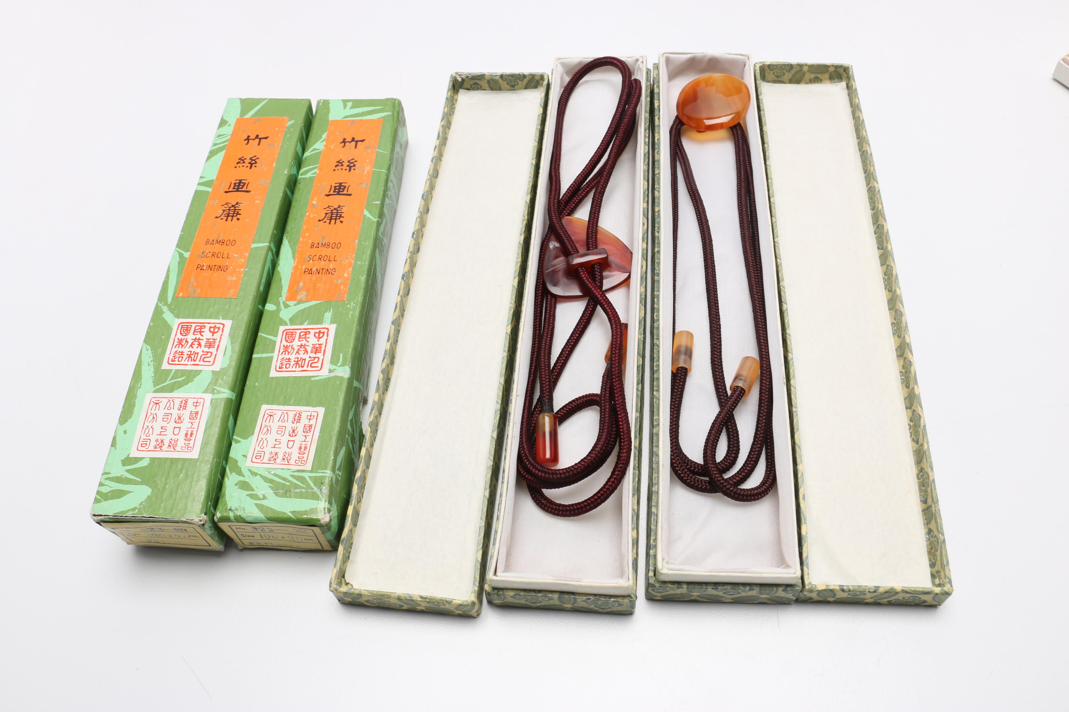 Large Assortment of Chinese Souvenirs Including Meerschaum Jewelry and Panda Items