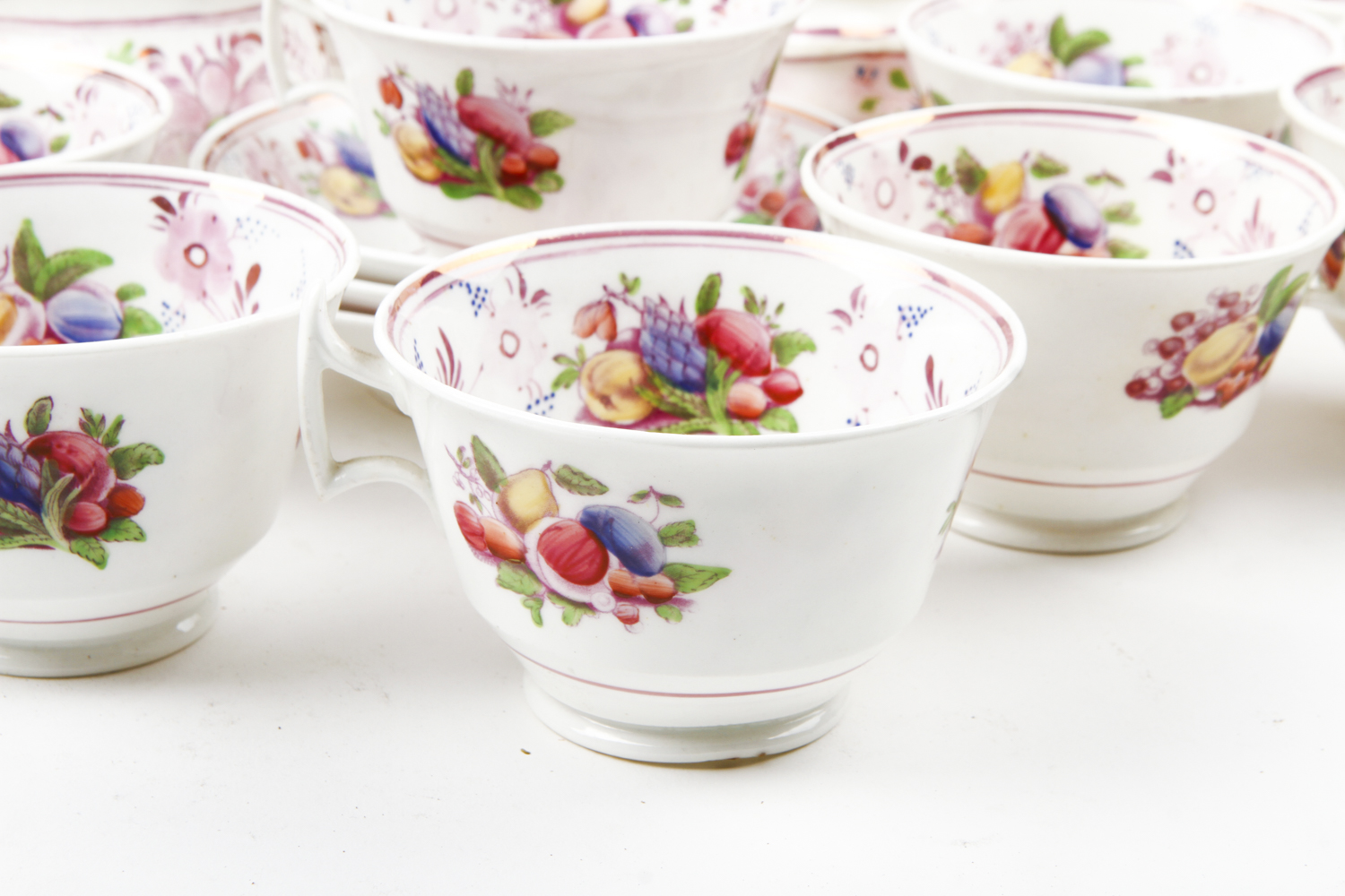 Collection of Antique English Pink Lustreware Tea Cups and Dishes