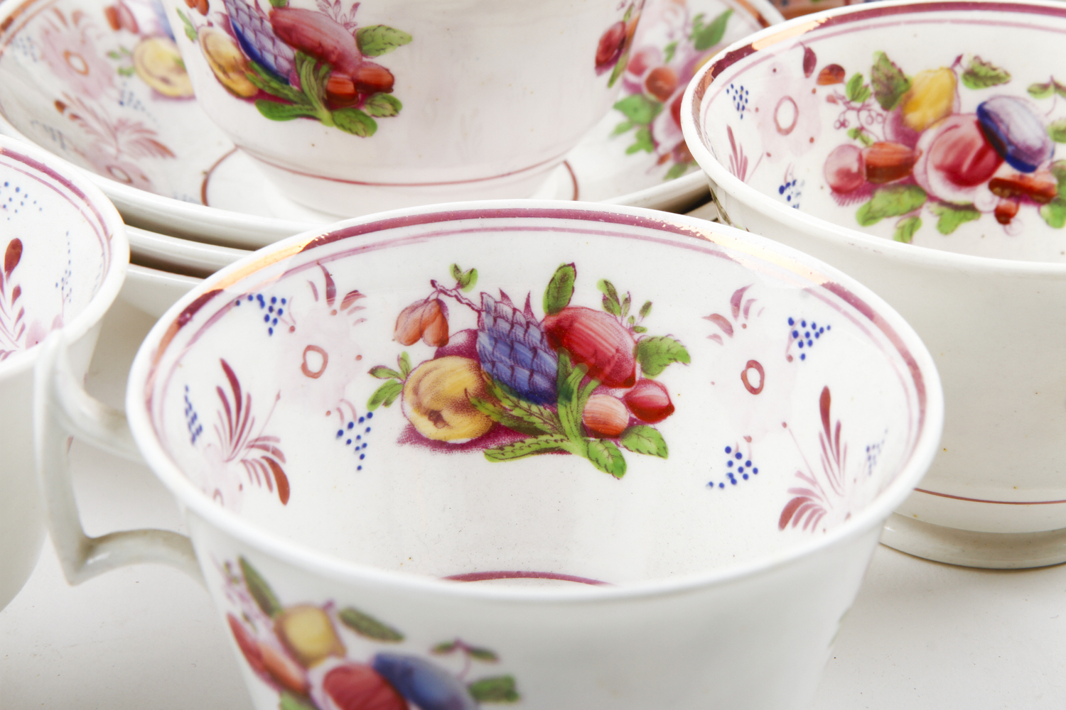 Collection of Antique English Pink Lustreware Tea Cups and Dishes