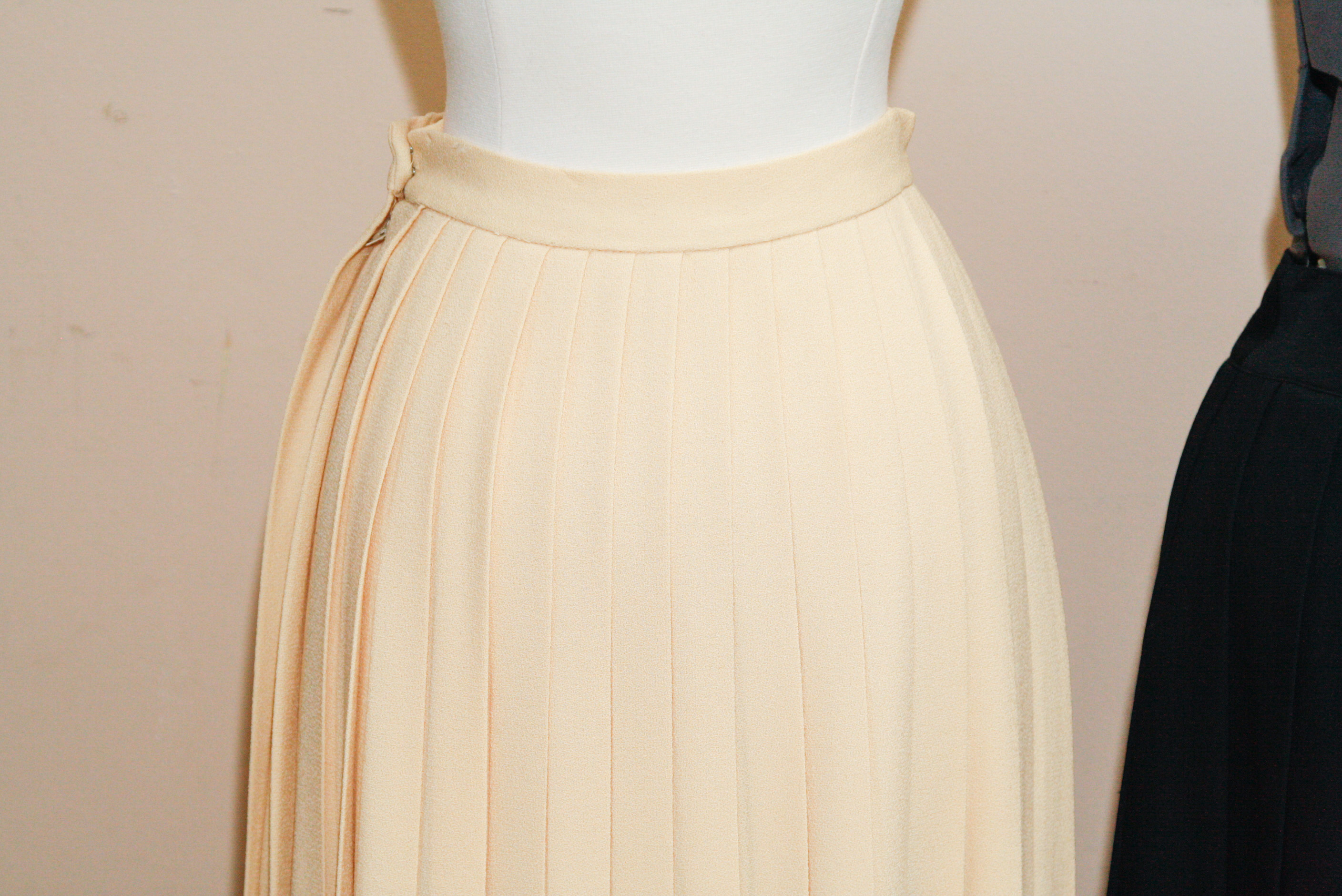 Pair of Women's Pleated Wool Skirts