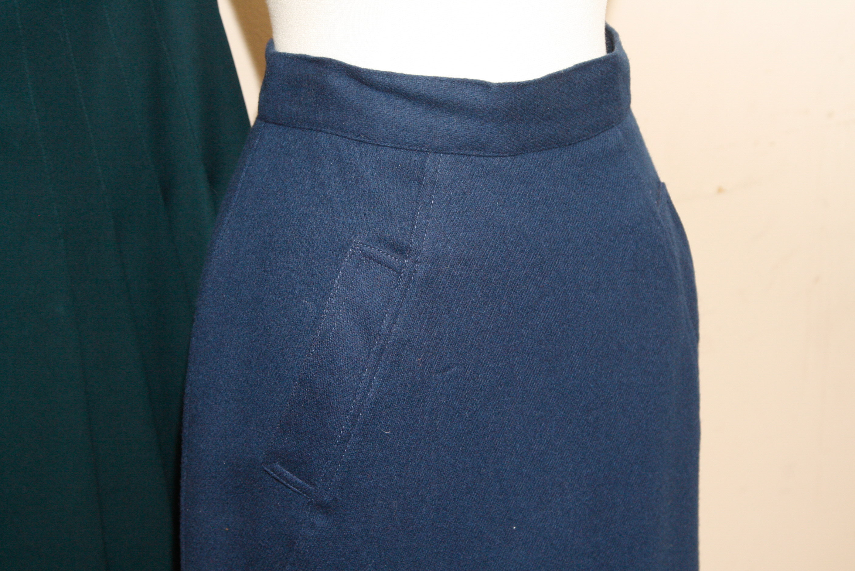 Group of  Mid-Length Wool Skirts Including Perry Ellis