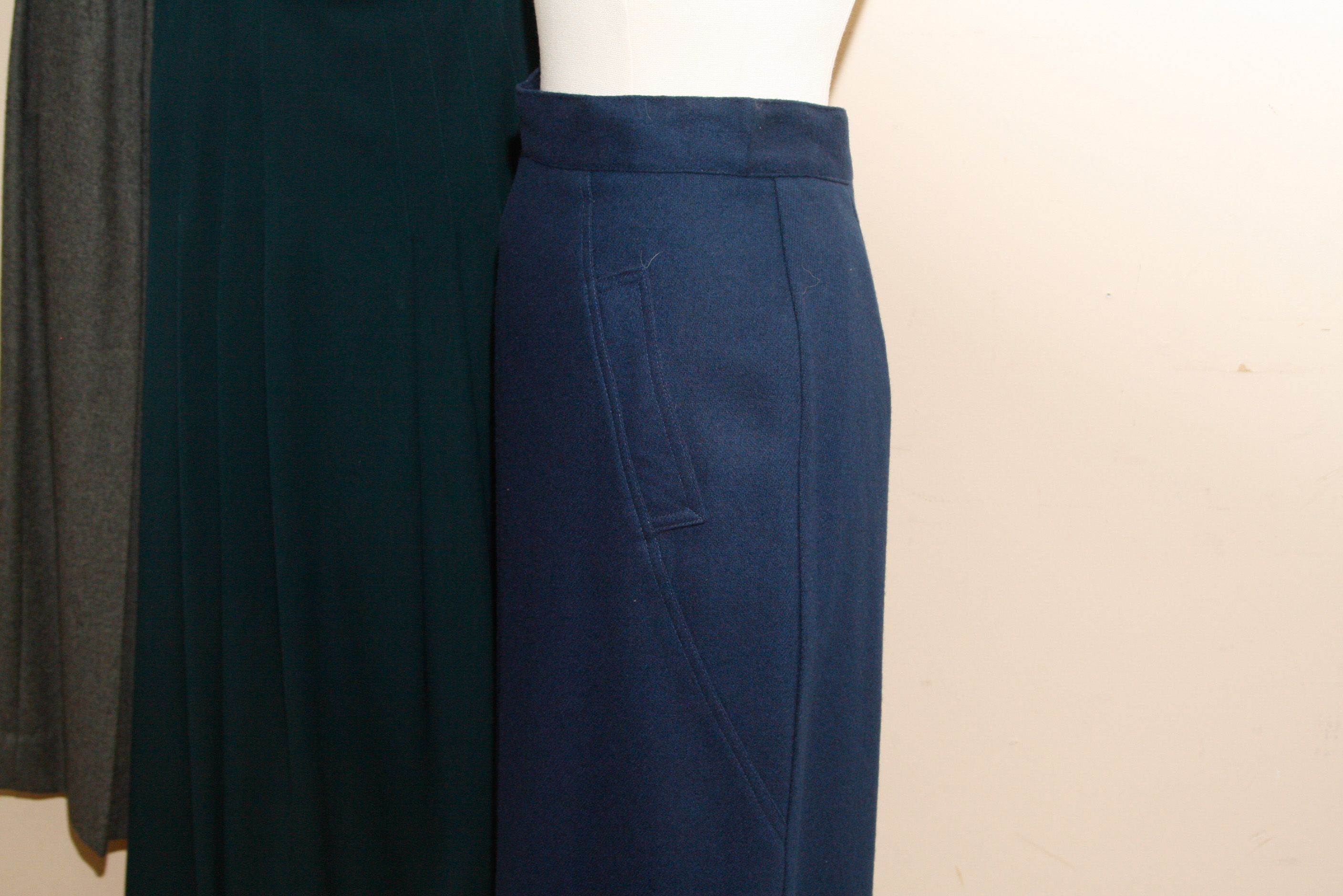 Group of  Mid-Length Wool Skirts Including Perry Ellis