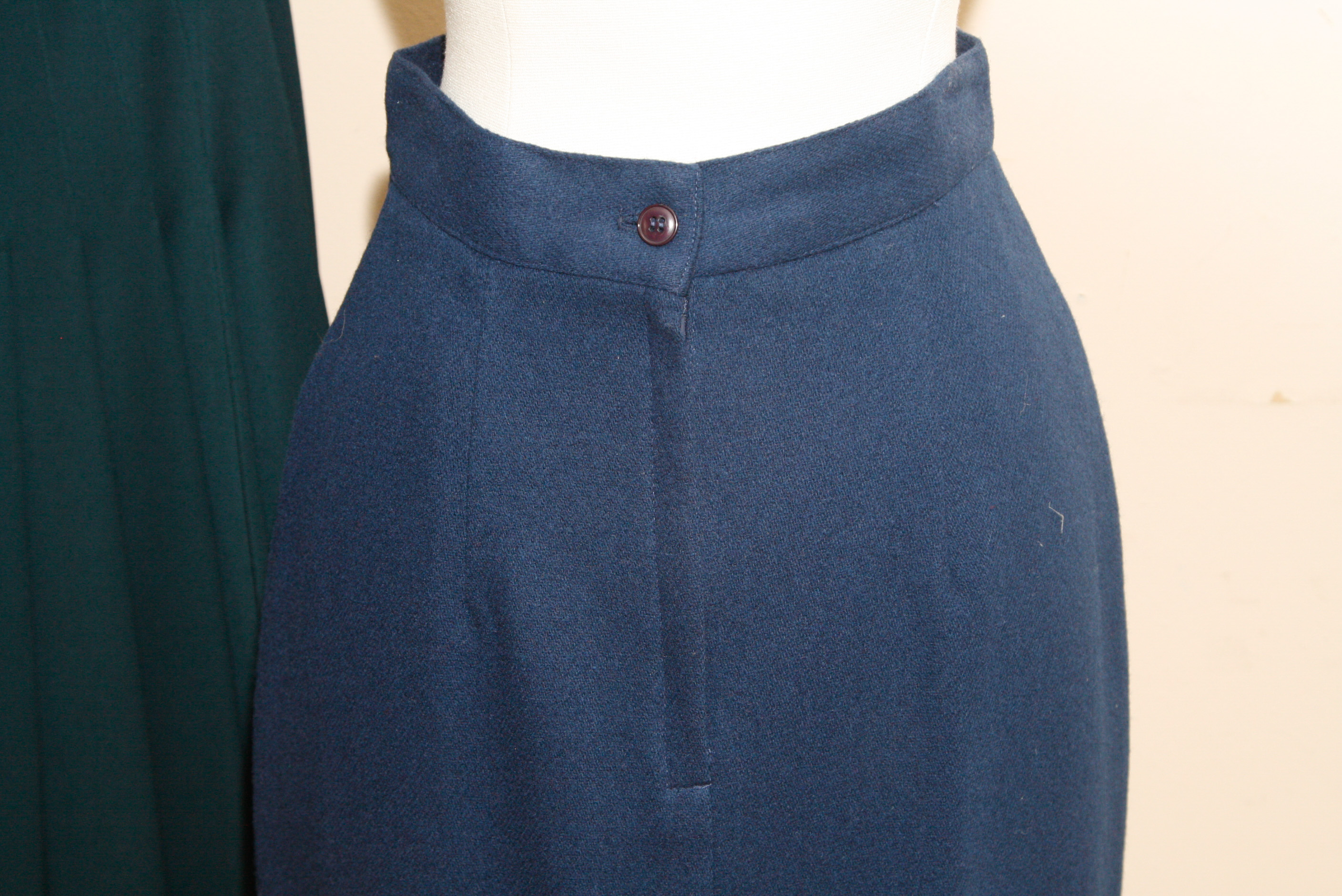 Group of  Mid-Length Wool Skirts Including Perry Ellis