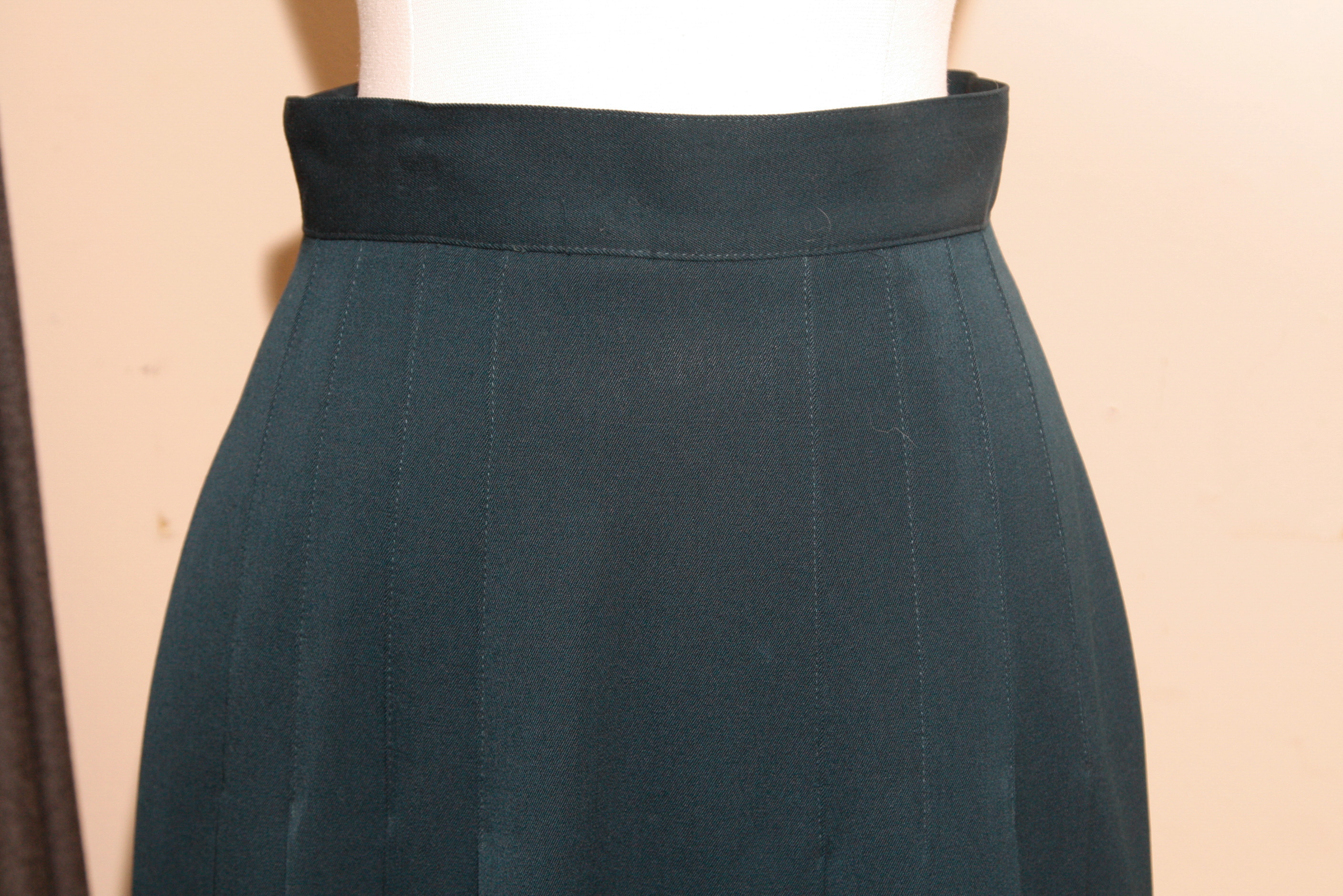 Group of  Mid-Length Wool Skirts Including Perry Ellis