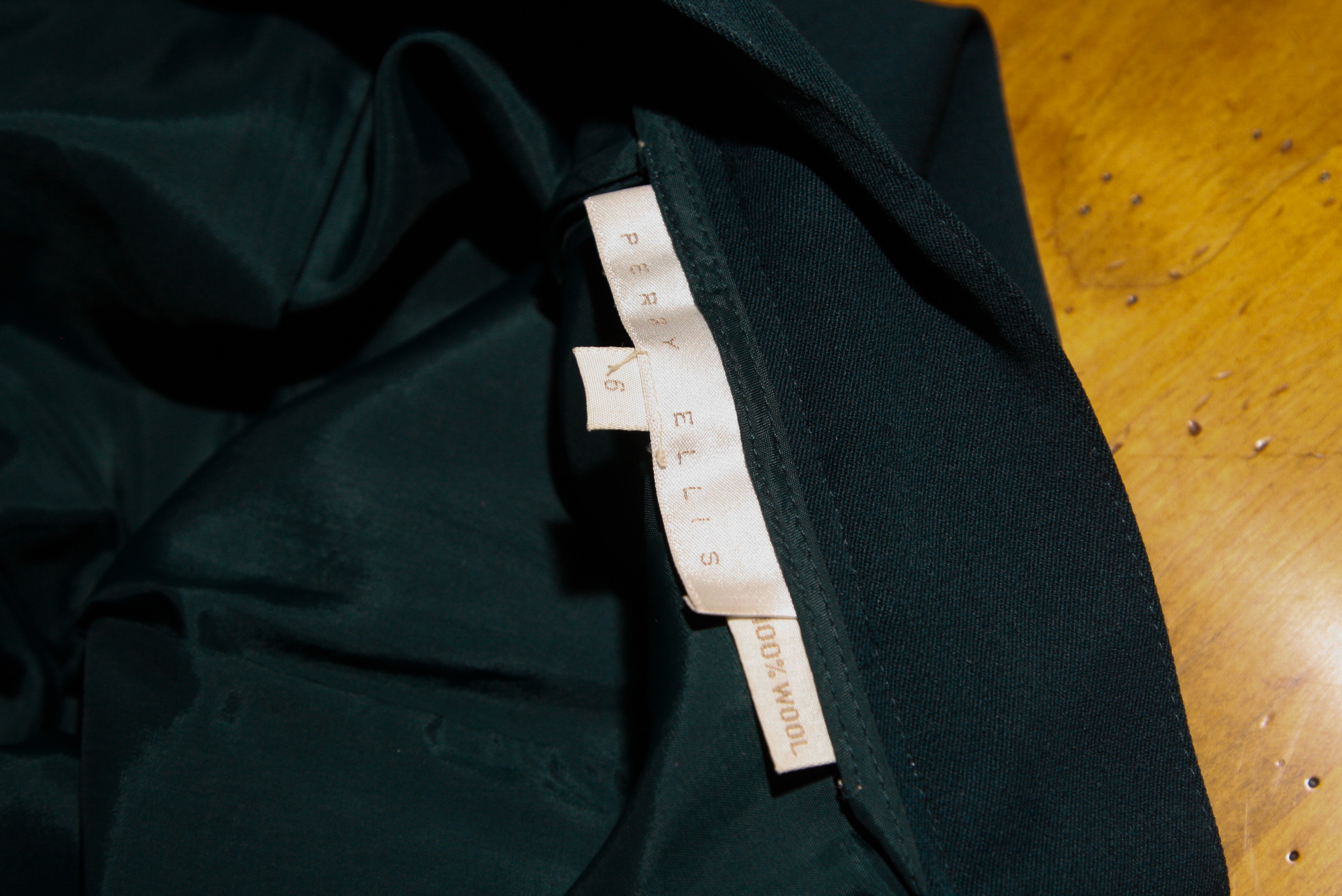 Group of  Mid-Length Wool Skirts Including Perry Ellis