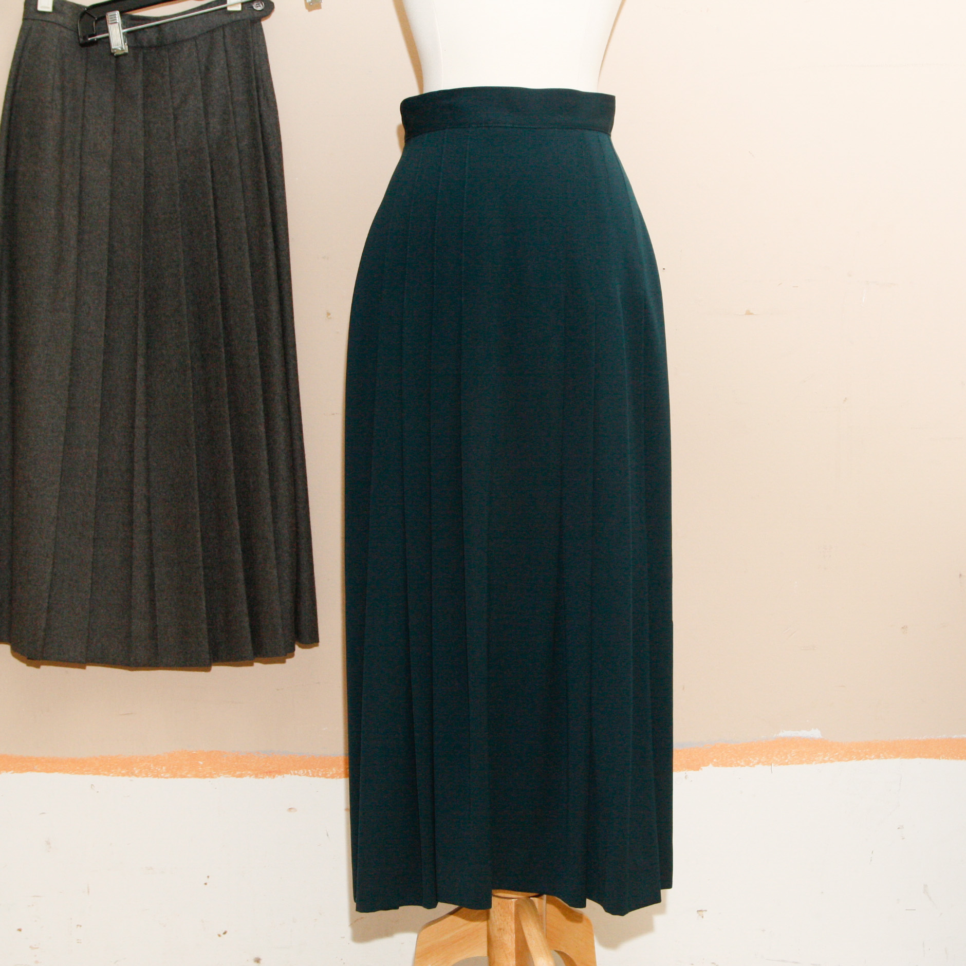 Group of  Mid-Length Wool Skirts Including Perry Ellis