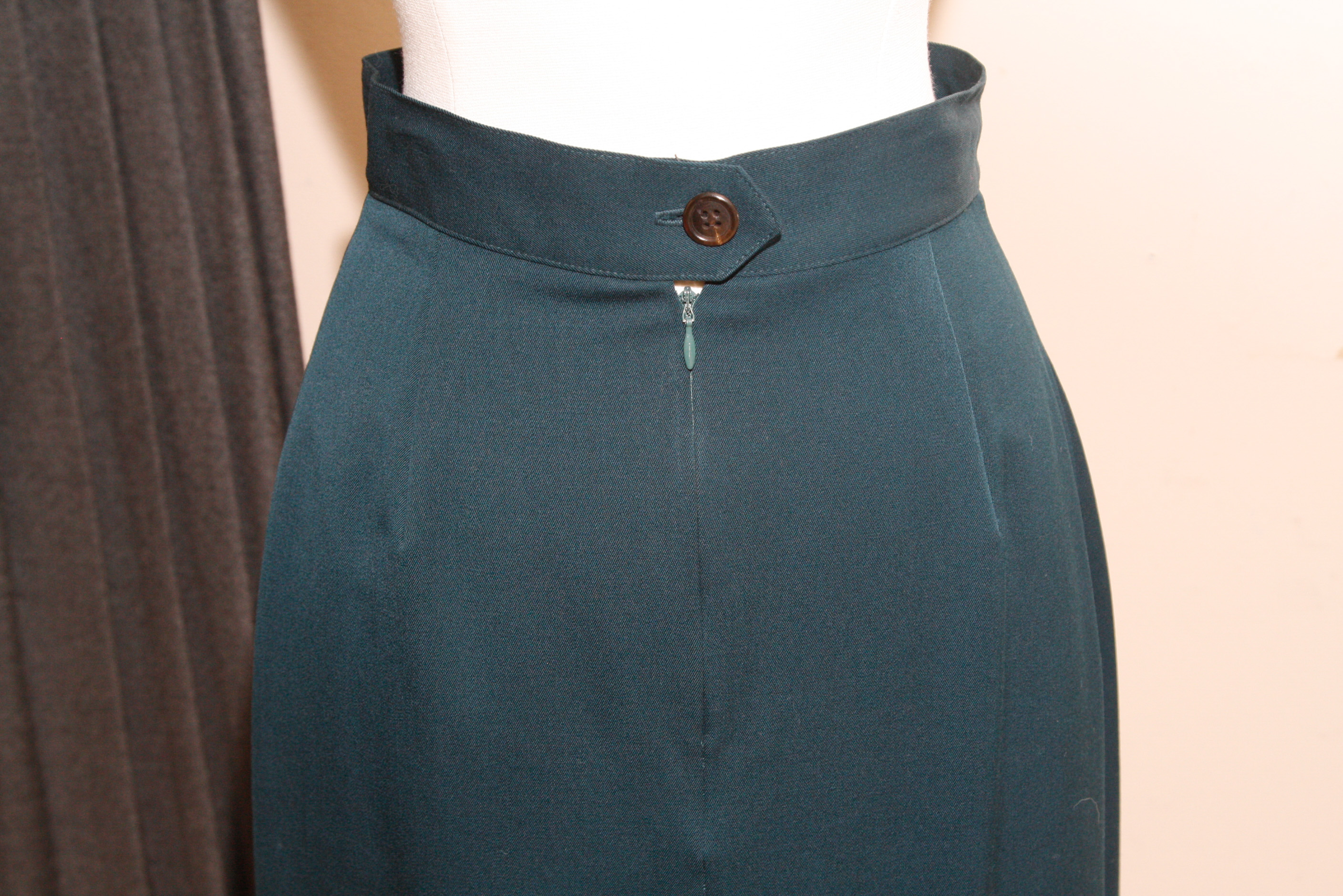 Group of  Mid-Length Wool Skirts Including Perry Ellis