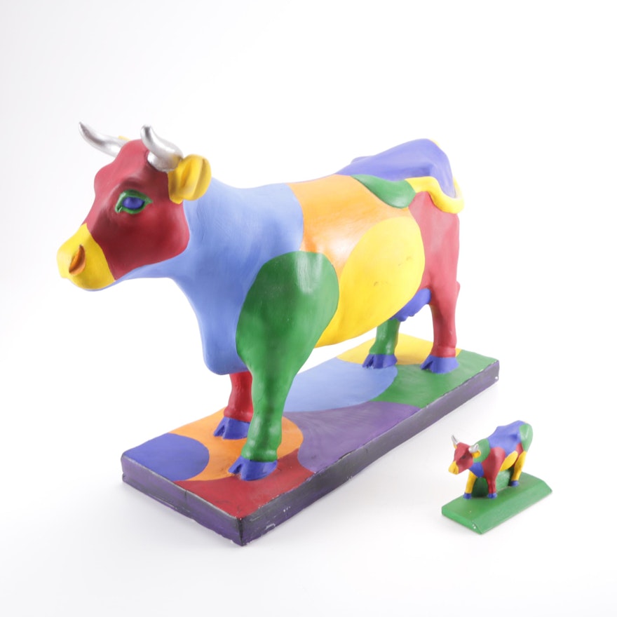 Carved and Painted Cow Figures
