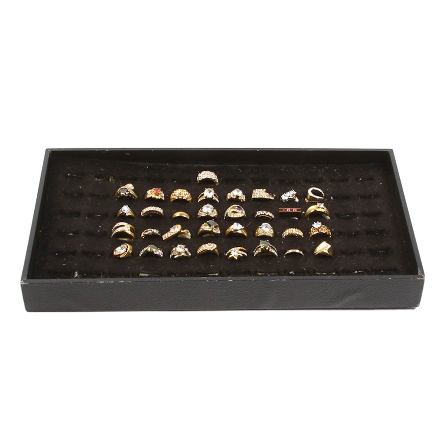 Collection of Gold-Toned Costume Rings in Tray