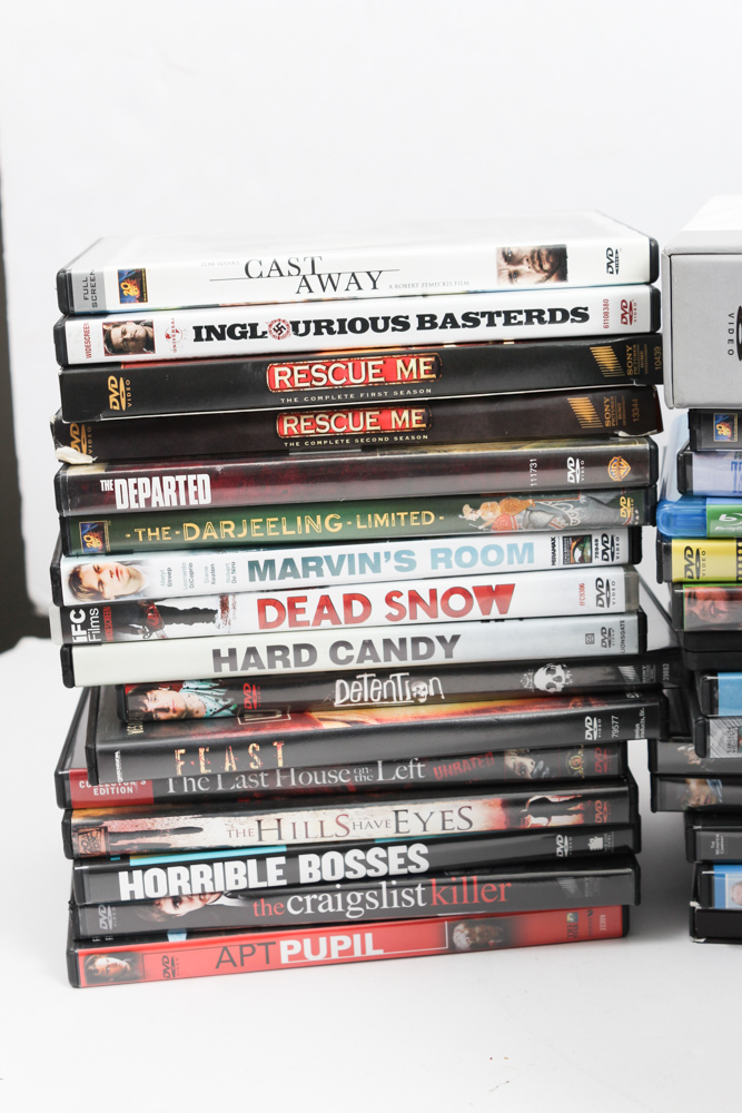 Magnavox Flat Screen Television/DVD Player and DVD Collection