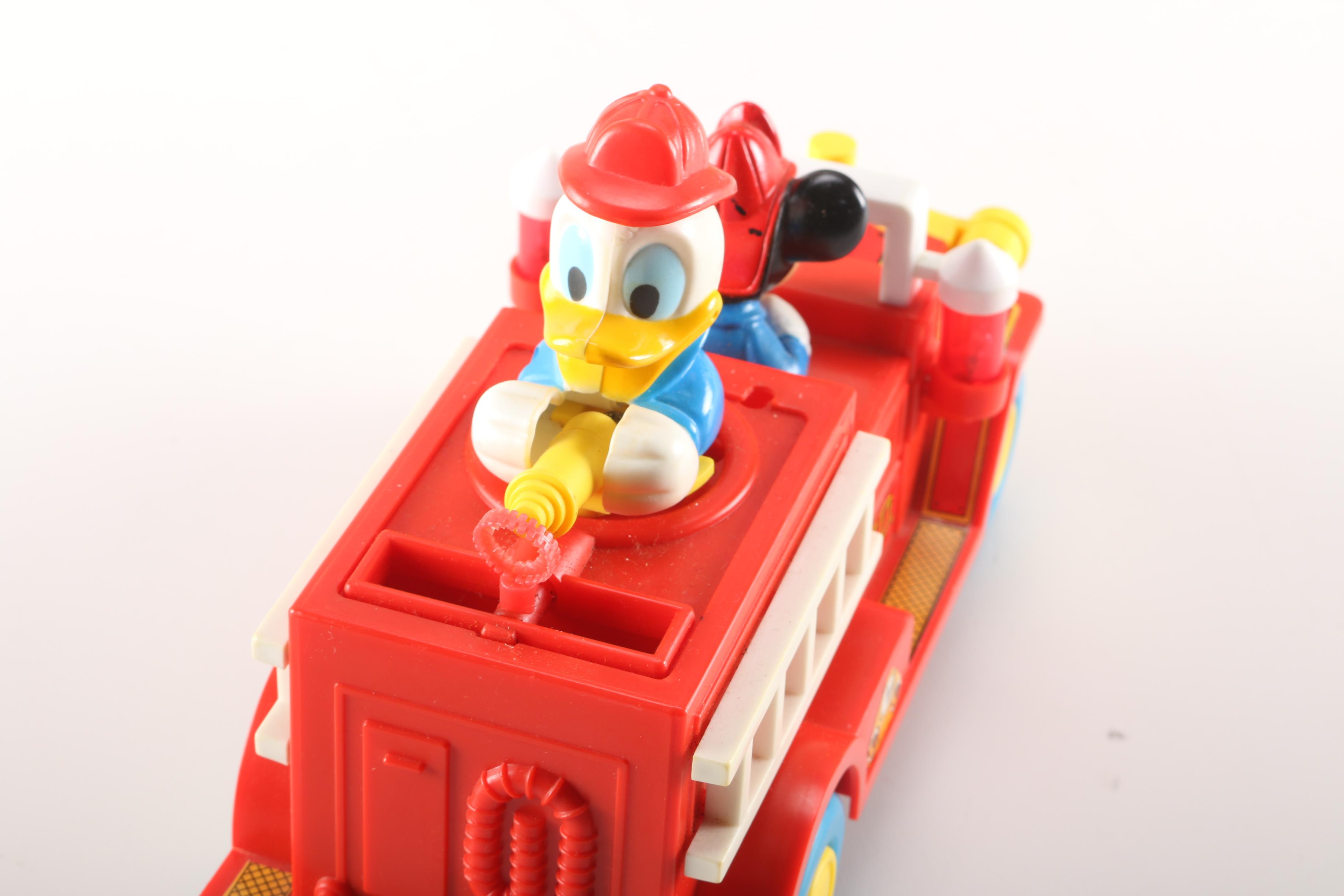 Mickey Mouse Collectibles Including Mickey Magician and a Fortune Teller