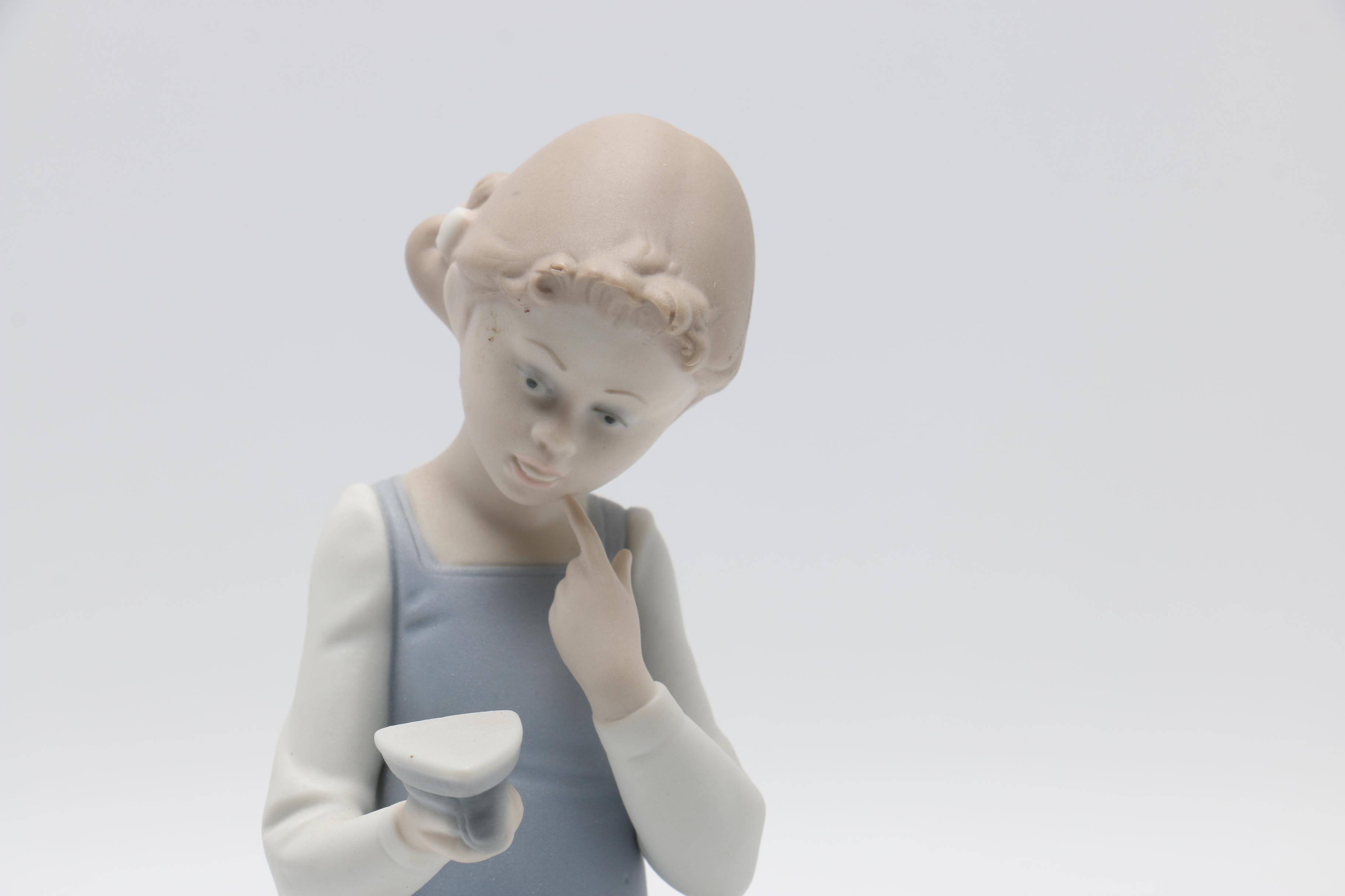 Lladró "Girl Ironing" Porcelain Figurine
