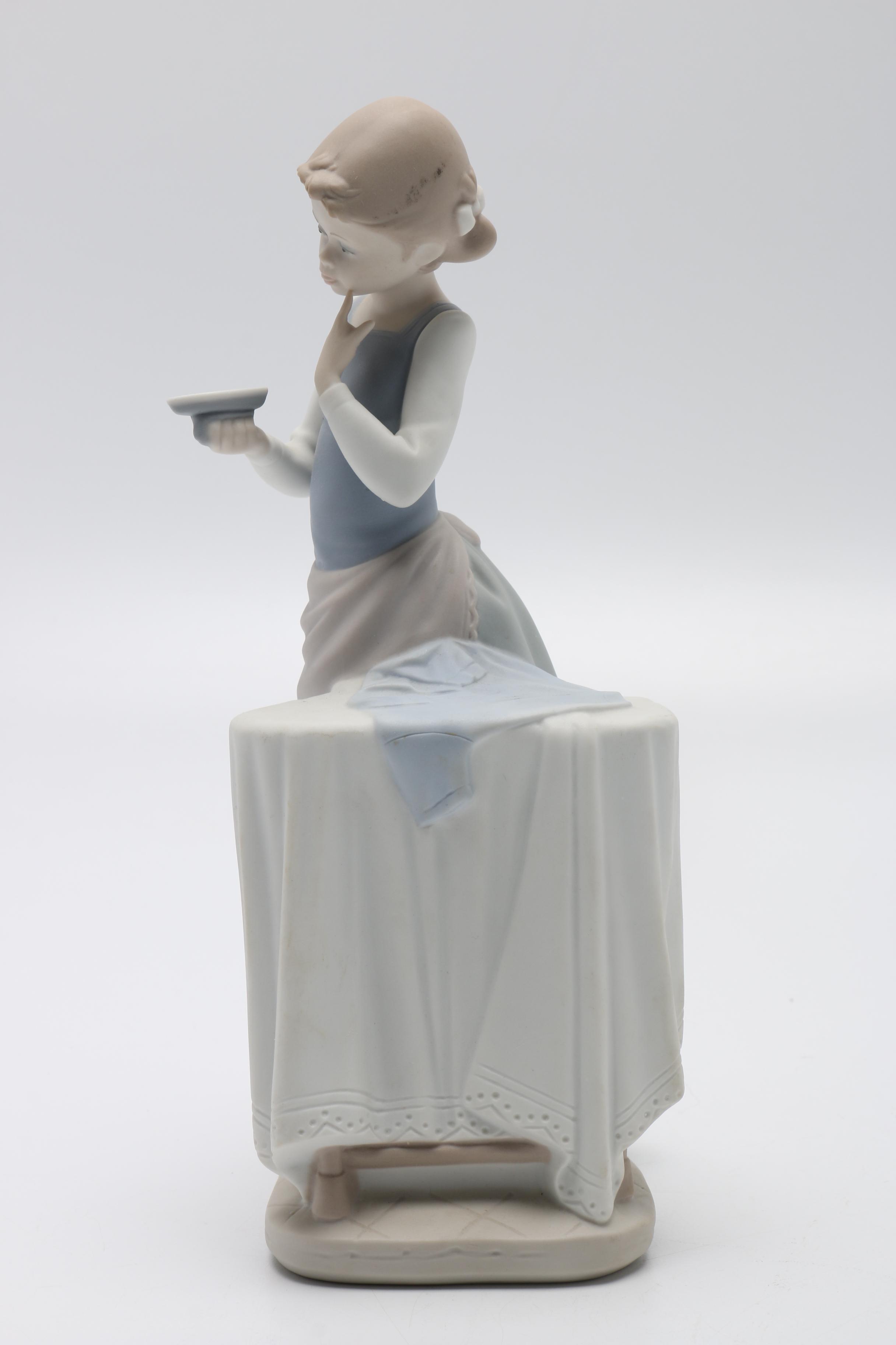 Lladró "Girl Ironing" Porcelain Figurine