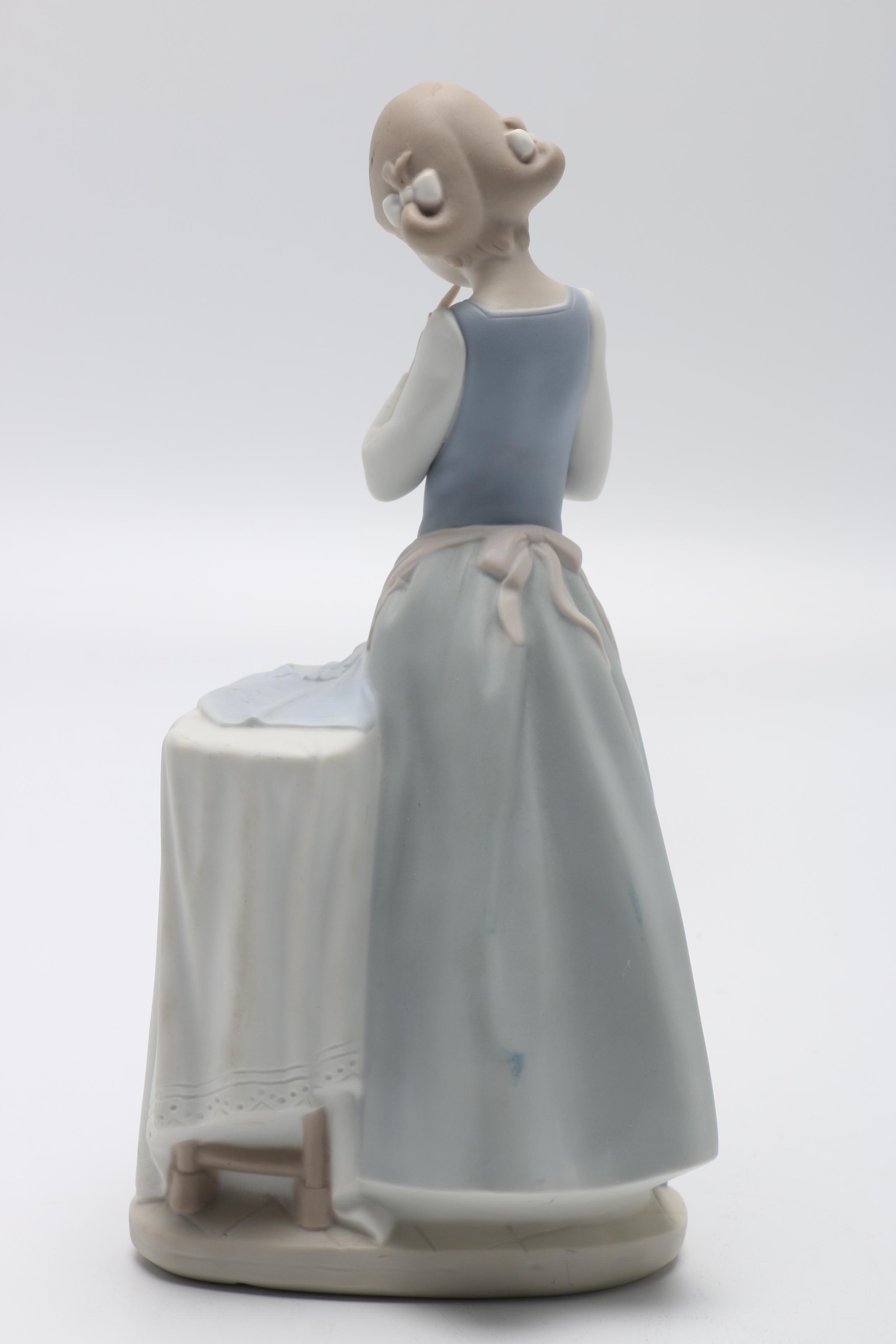Lladró "Girl Ironing" Porcelain Figurine