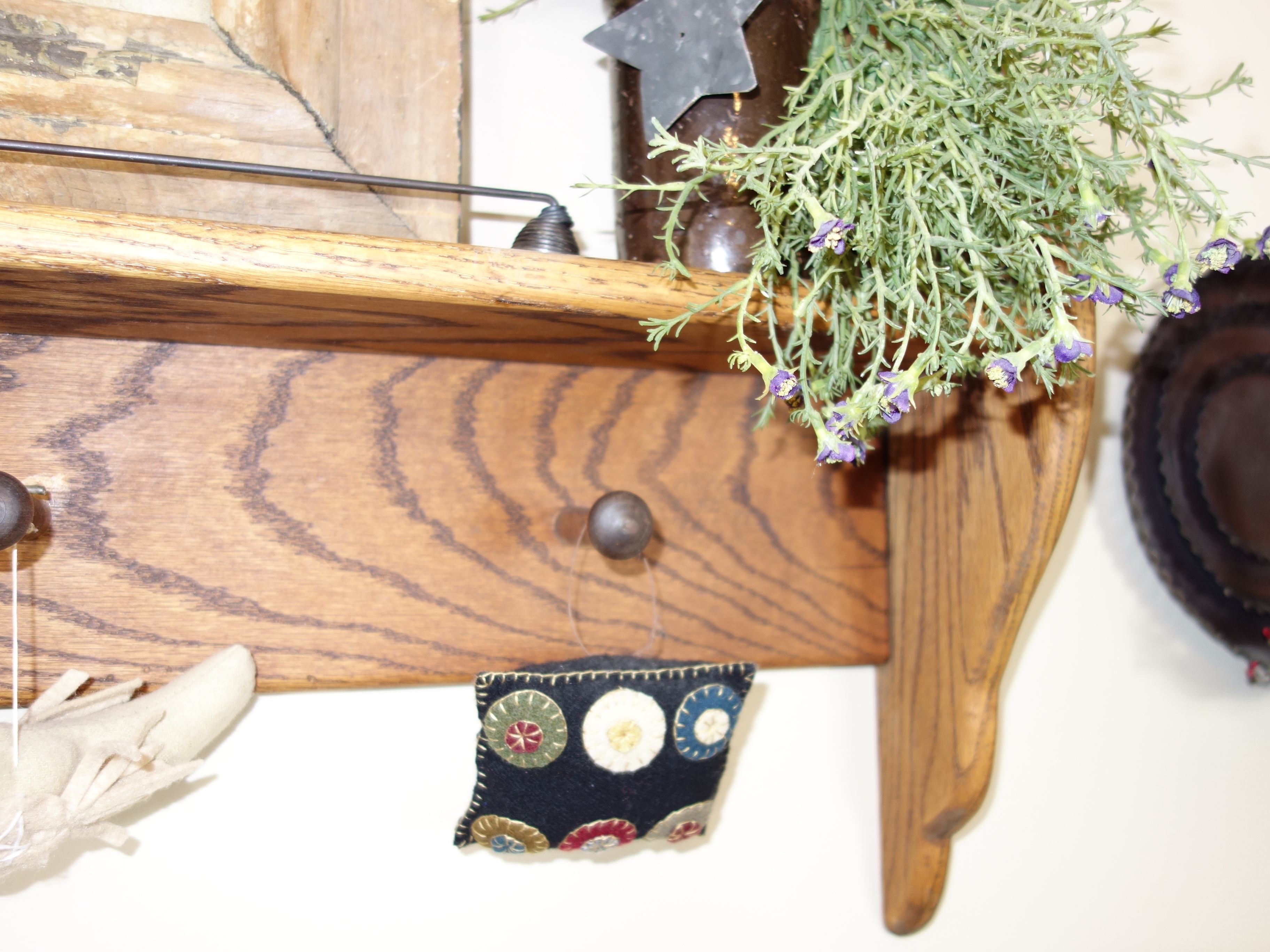 Wooden Wall Shelf With Collectibles