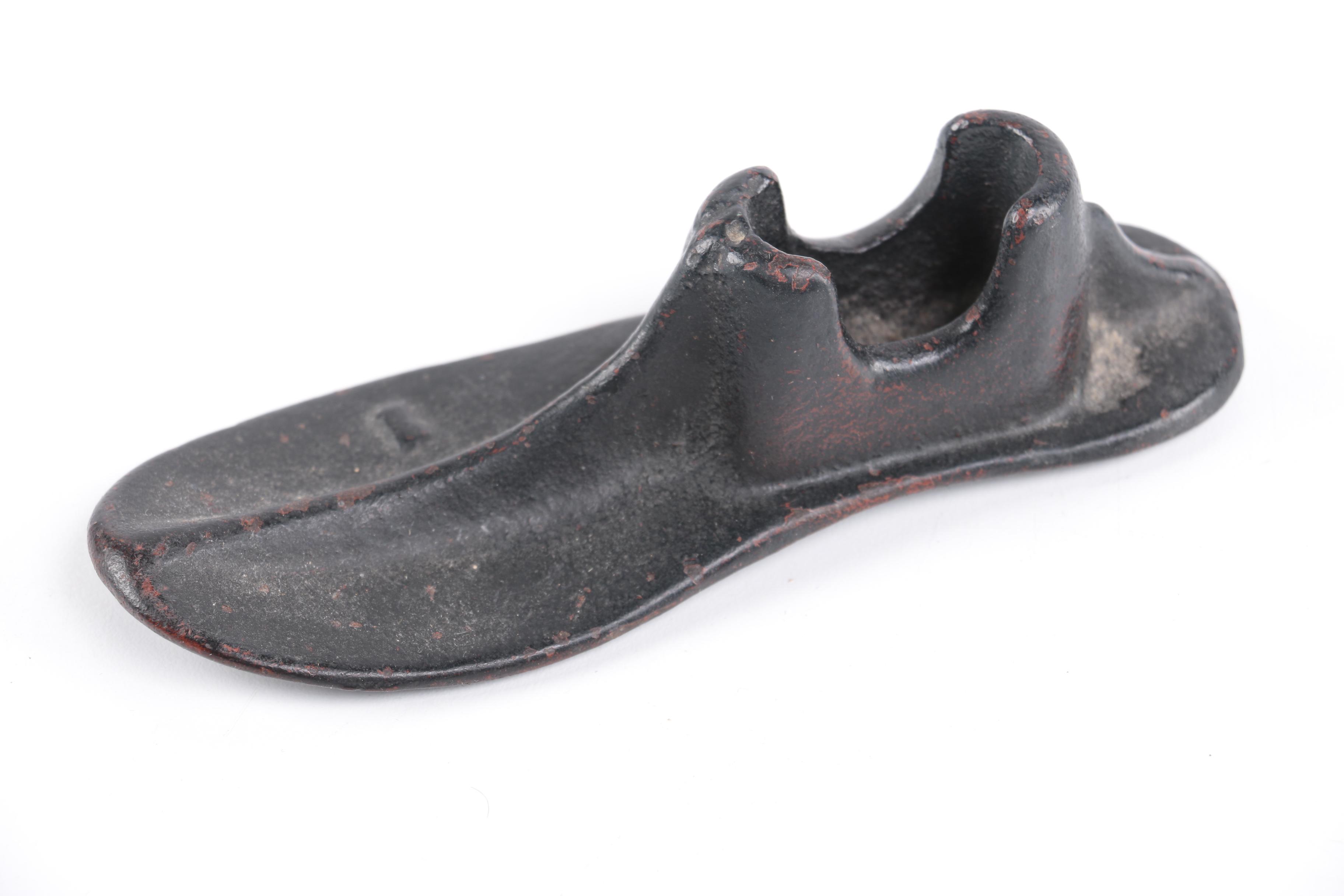 Assorted Iron and Shoe Themed Decor