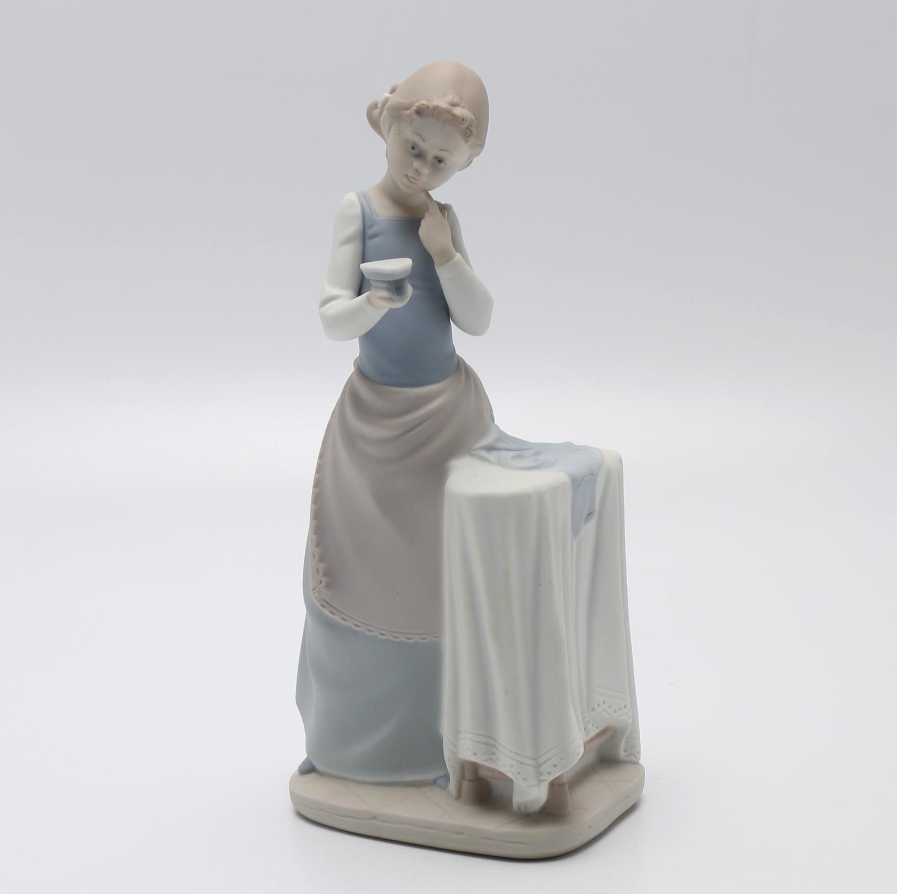 Lladró "Girl Ironing" Porcelain Figurine