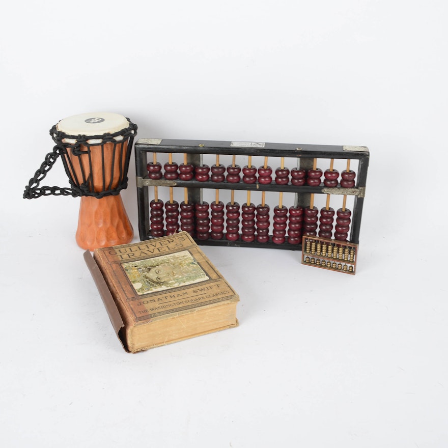 Pair of Abacus, Meinl Tribal Drum and Old "Gullivers Travel's" Book