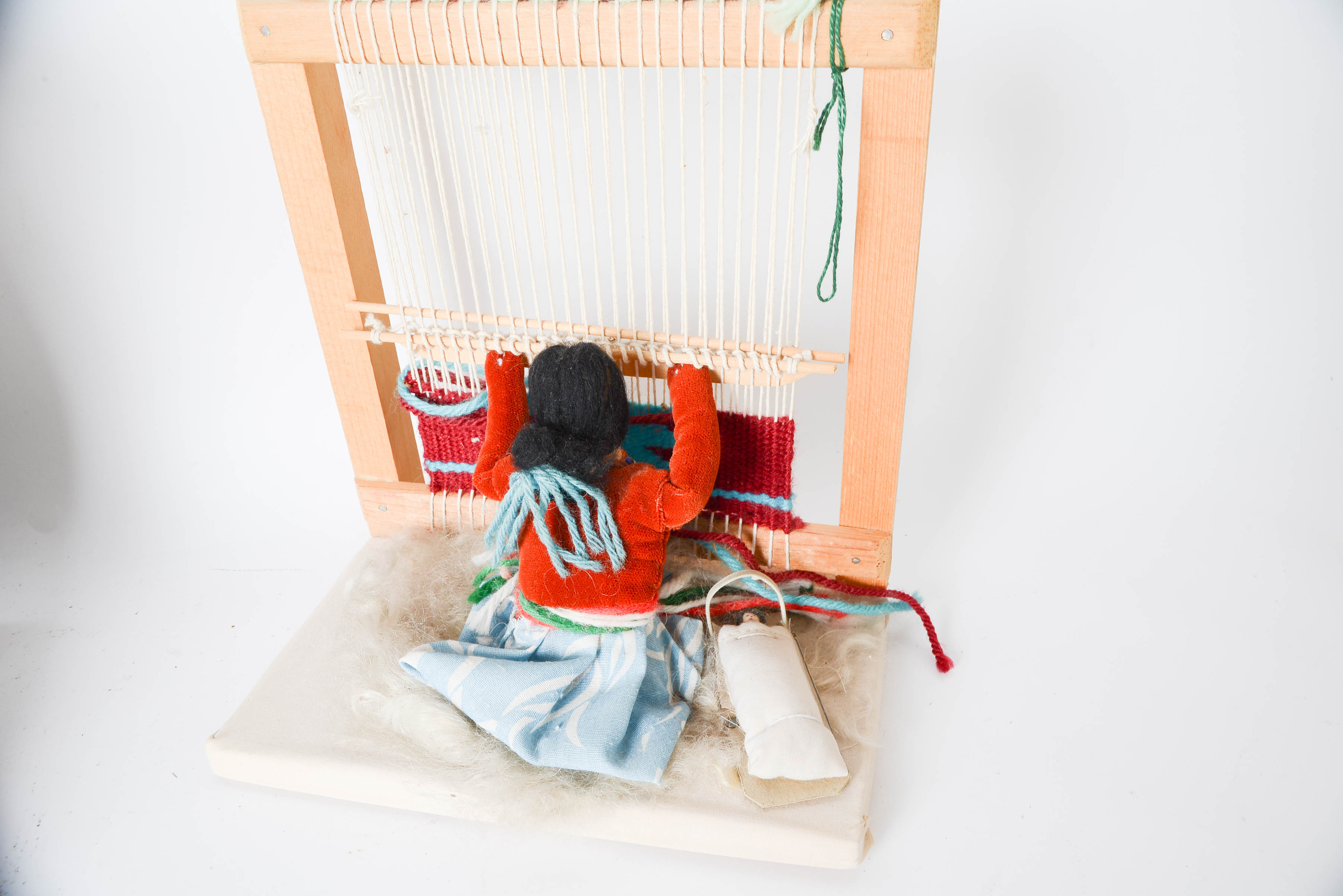 Grandma's Weaving Wheel and Girl Weaving Blanket
