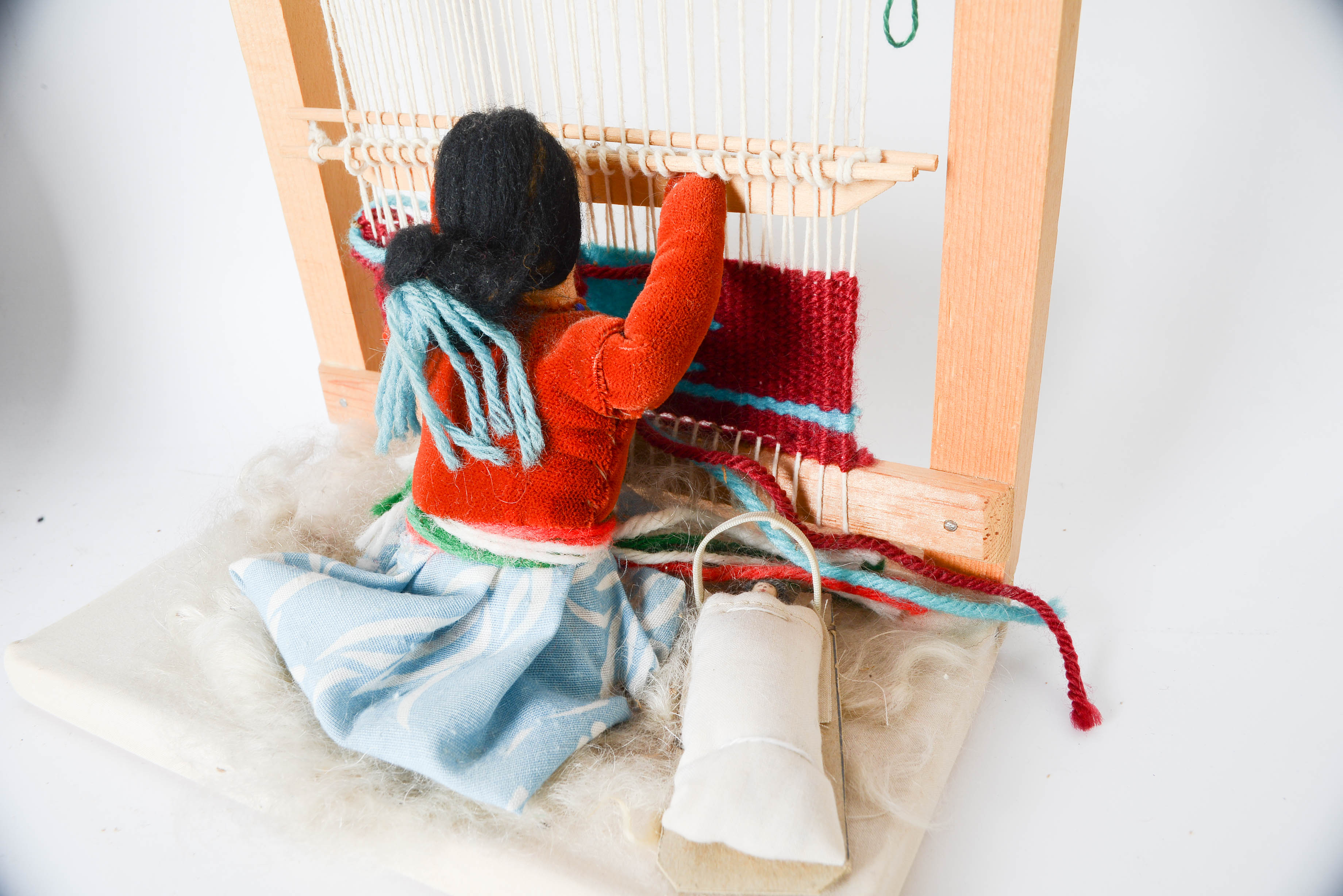 Grandma's Weaving Wheel and Girl Weaving Blanket