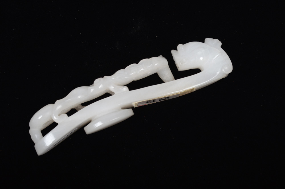 A Fine Chinese White Jade Carved Dragon Belt Hook