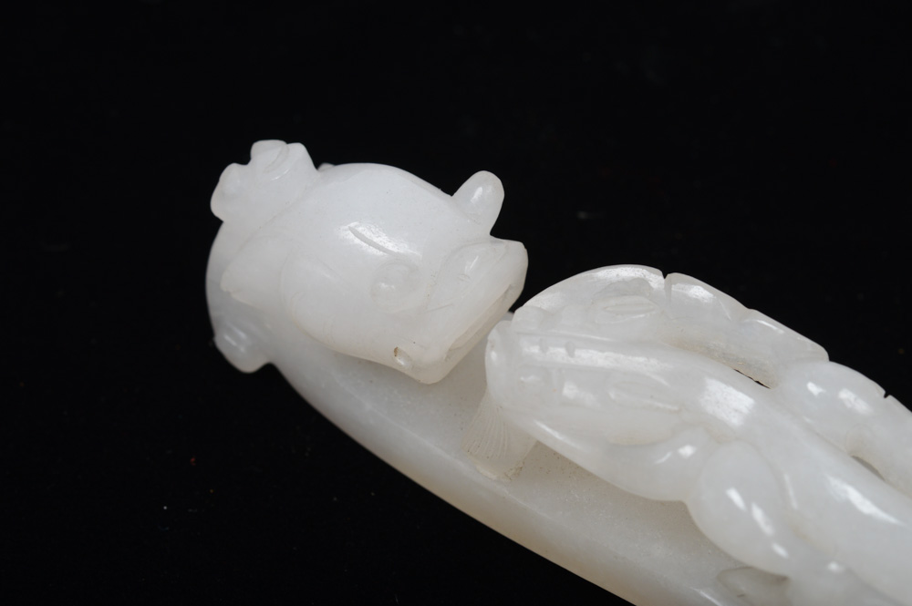 A Fine Chinese White Jade Carved Dragon Belt Hook