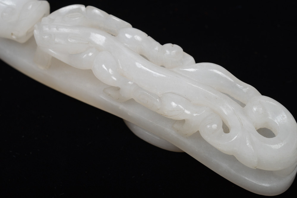 A Fine Chinese White Jade Carved Dragon Belt Hook