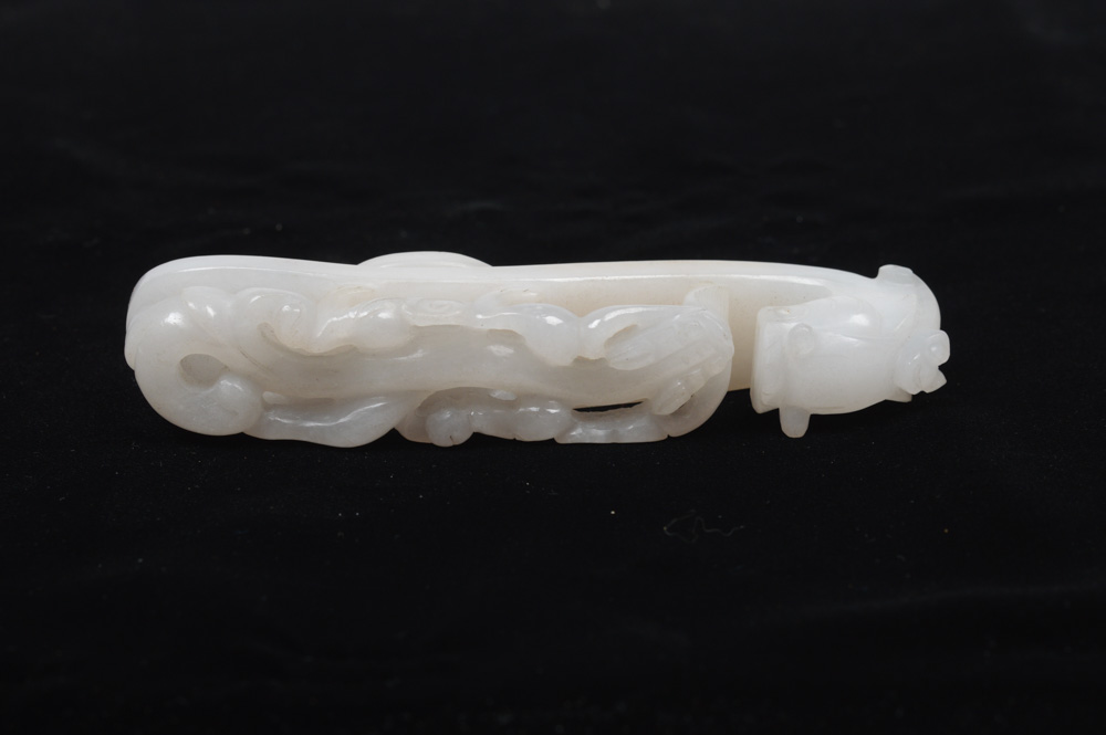 A Fine Chinese White Jade Carved Dragon Belt Hook