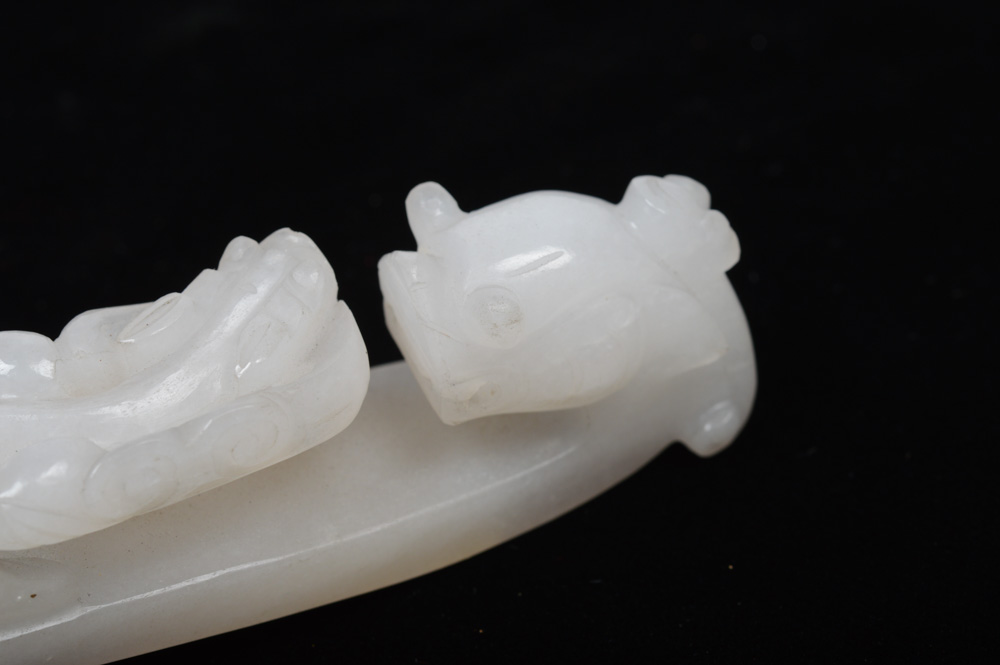 A Fine Chinese White Jade Carved Dragon Belt Hook