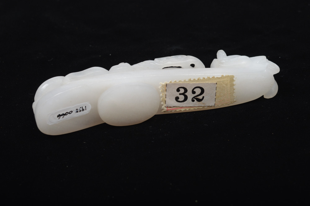 A Fine Chinese White Jade Carved Dragon Belt Hook