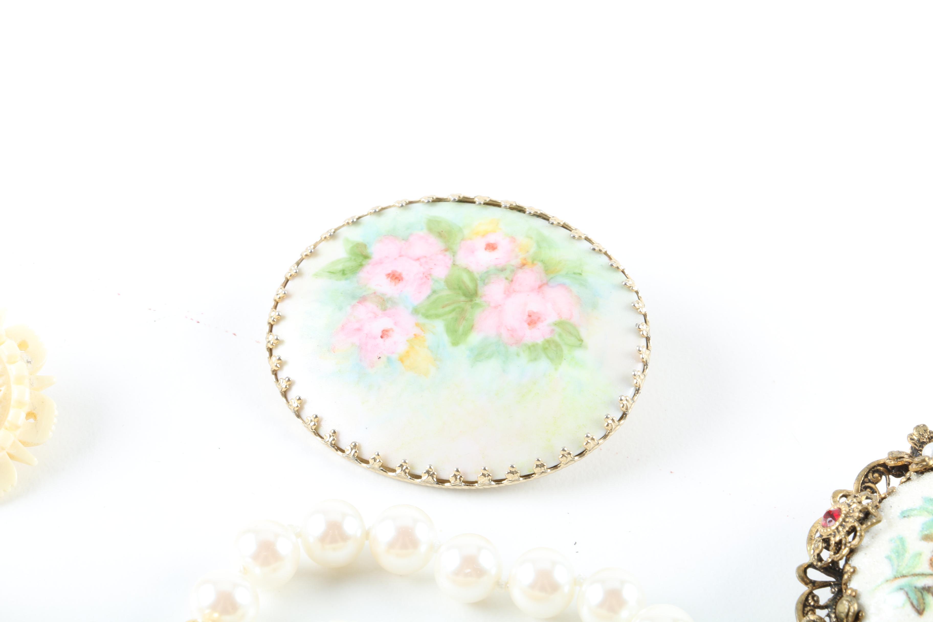 Floral Inspired Brooches, Rings, and Earrings