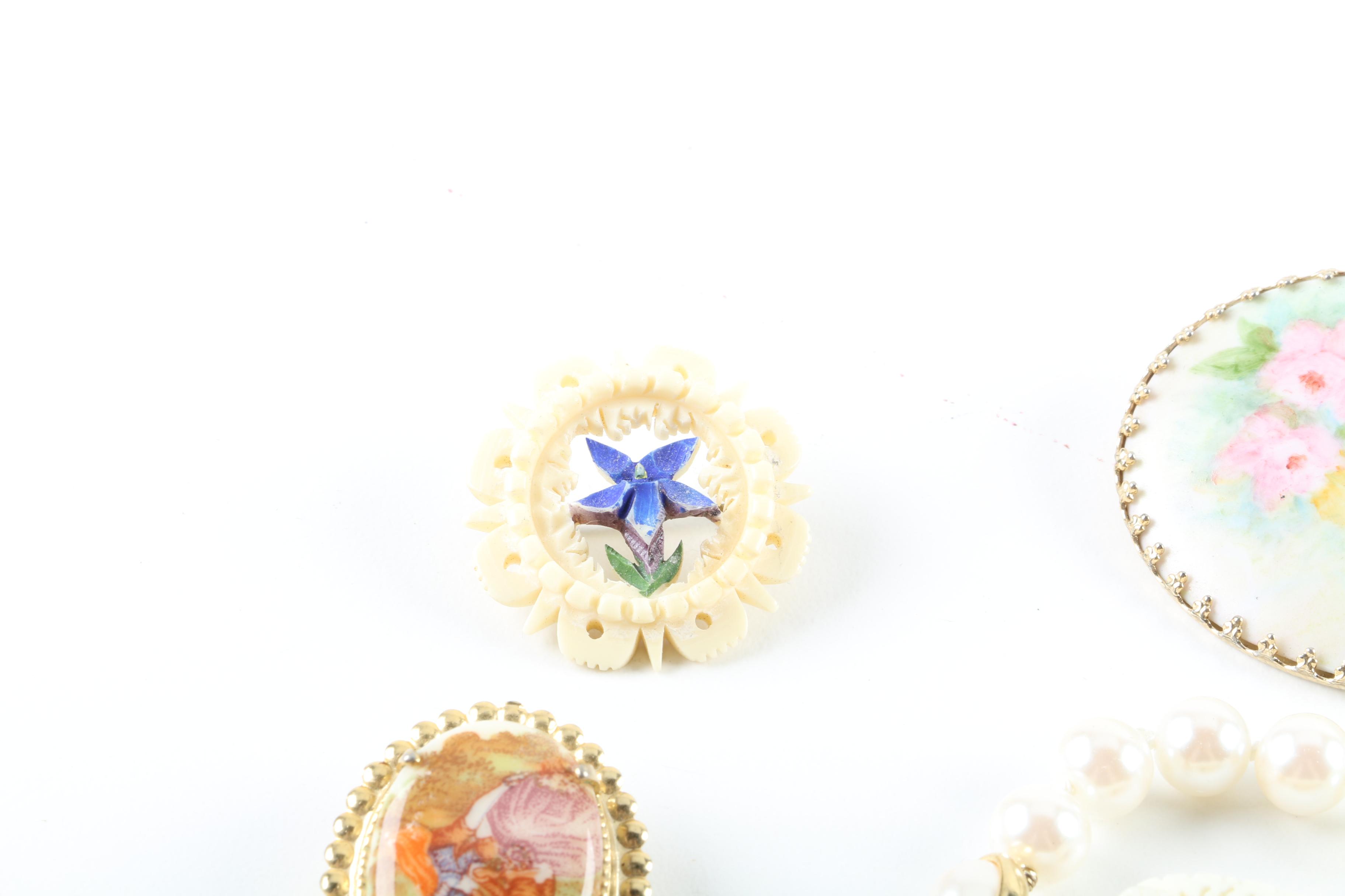 Floral Inspired Brooches, Rings, and Earrings