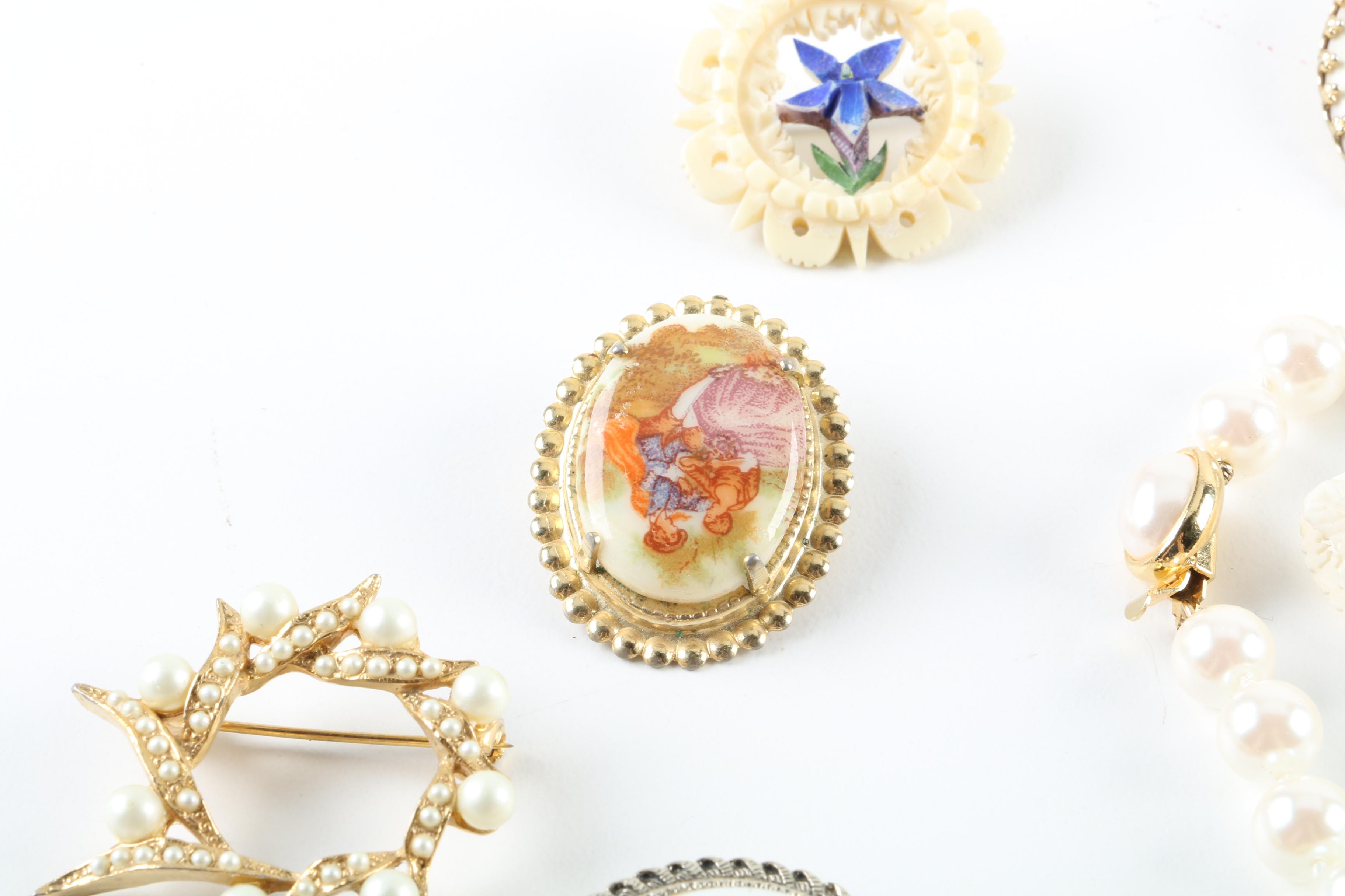Floral Inspired Brooches, Rings, and Earrings