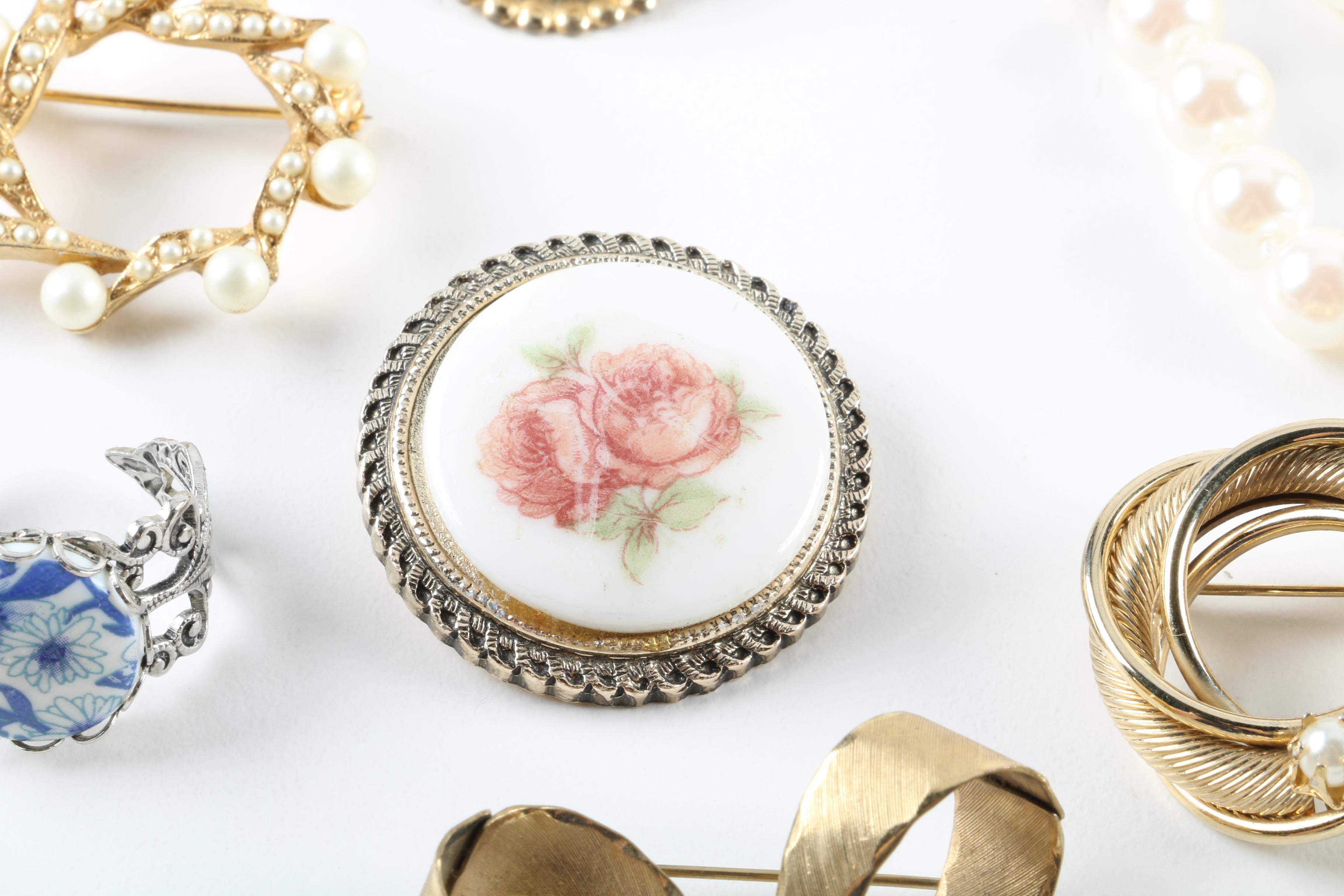Floral Inspired Brooches, Rings, and Earrings