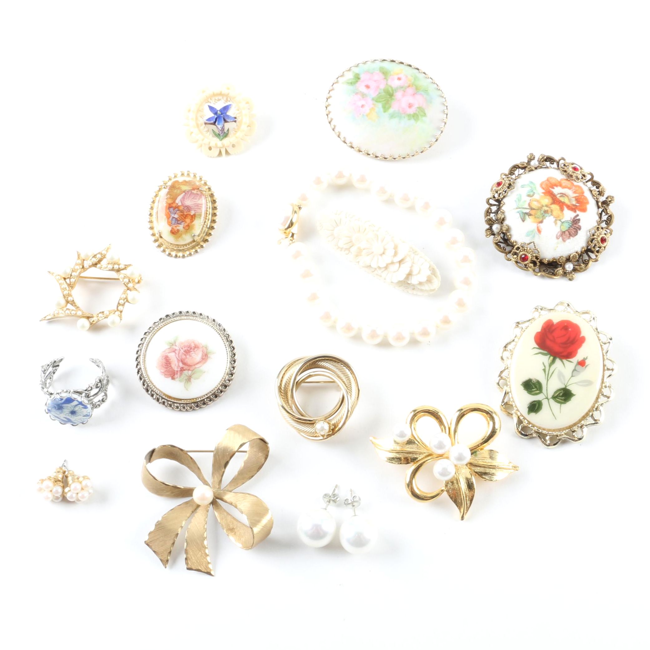 Floral Inspired Brooches, Rings, and Earrings