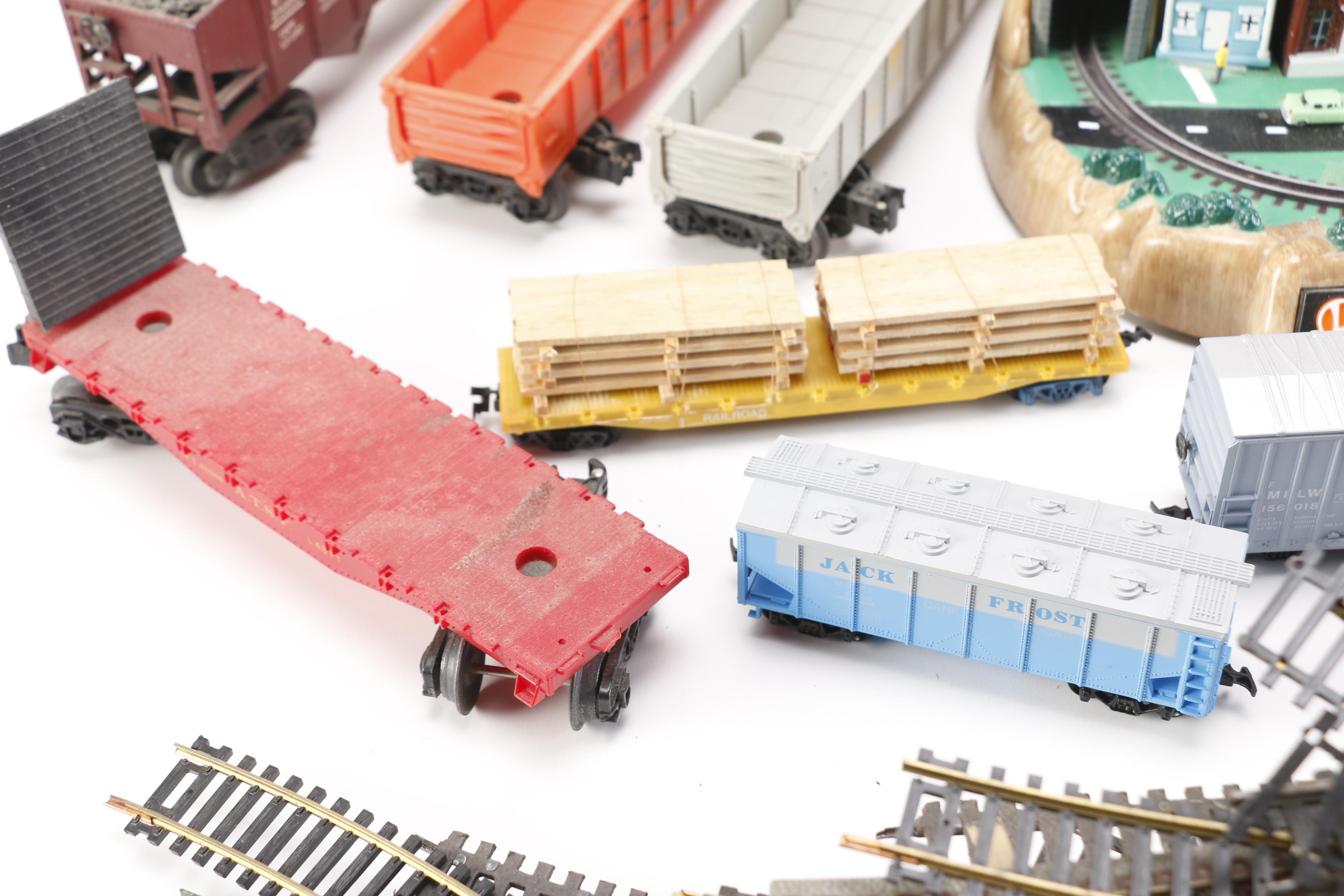 Train Cars, Track and Accessories With Lionelville Alarm Clock