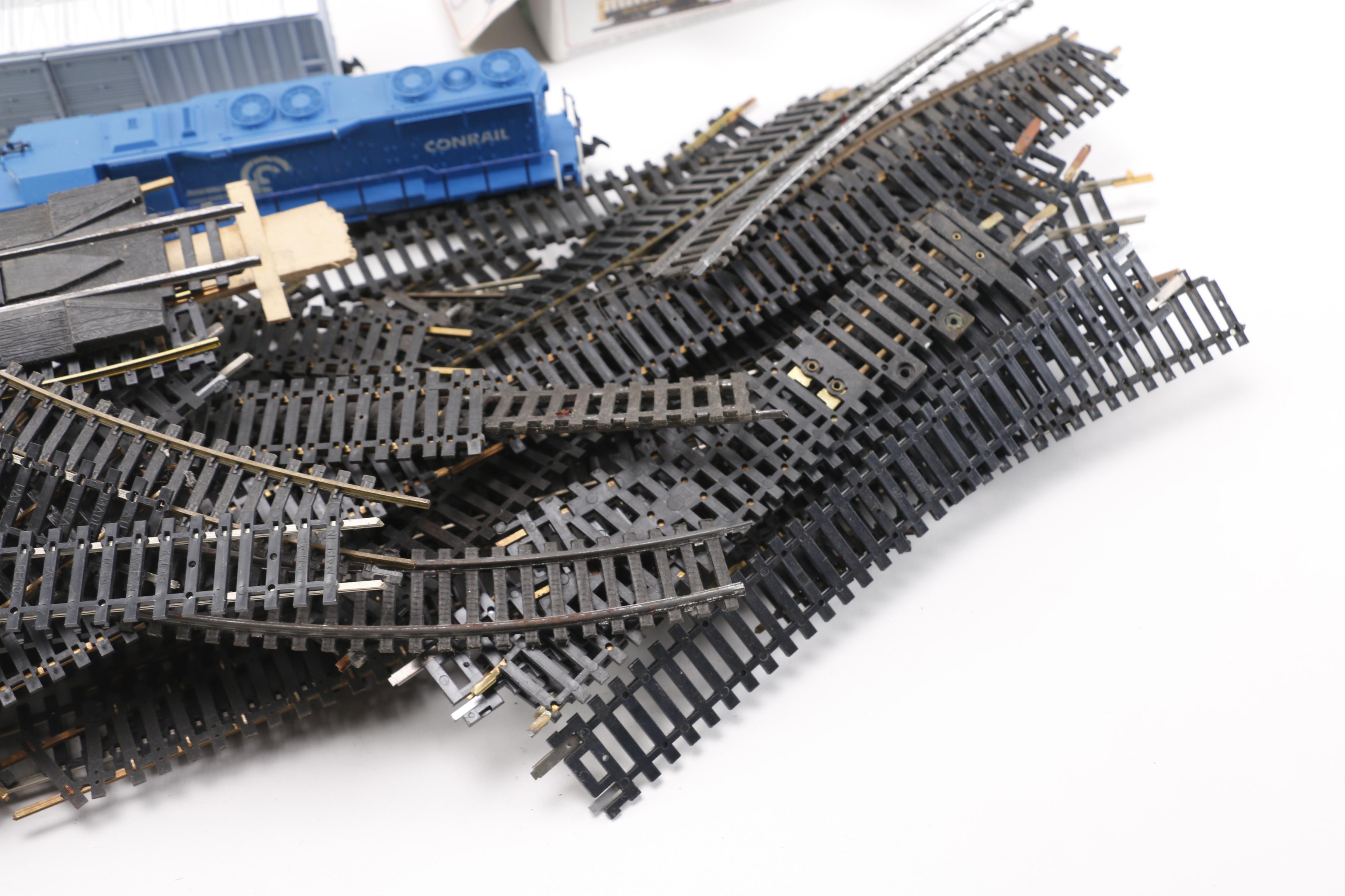 Train Cars, Track and Accessories With Lionelville Alarm Clock