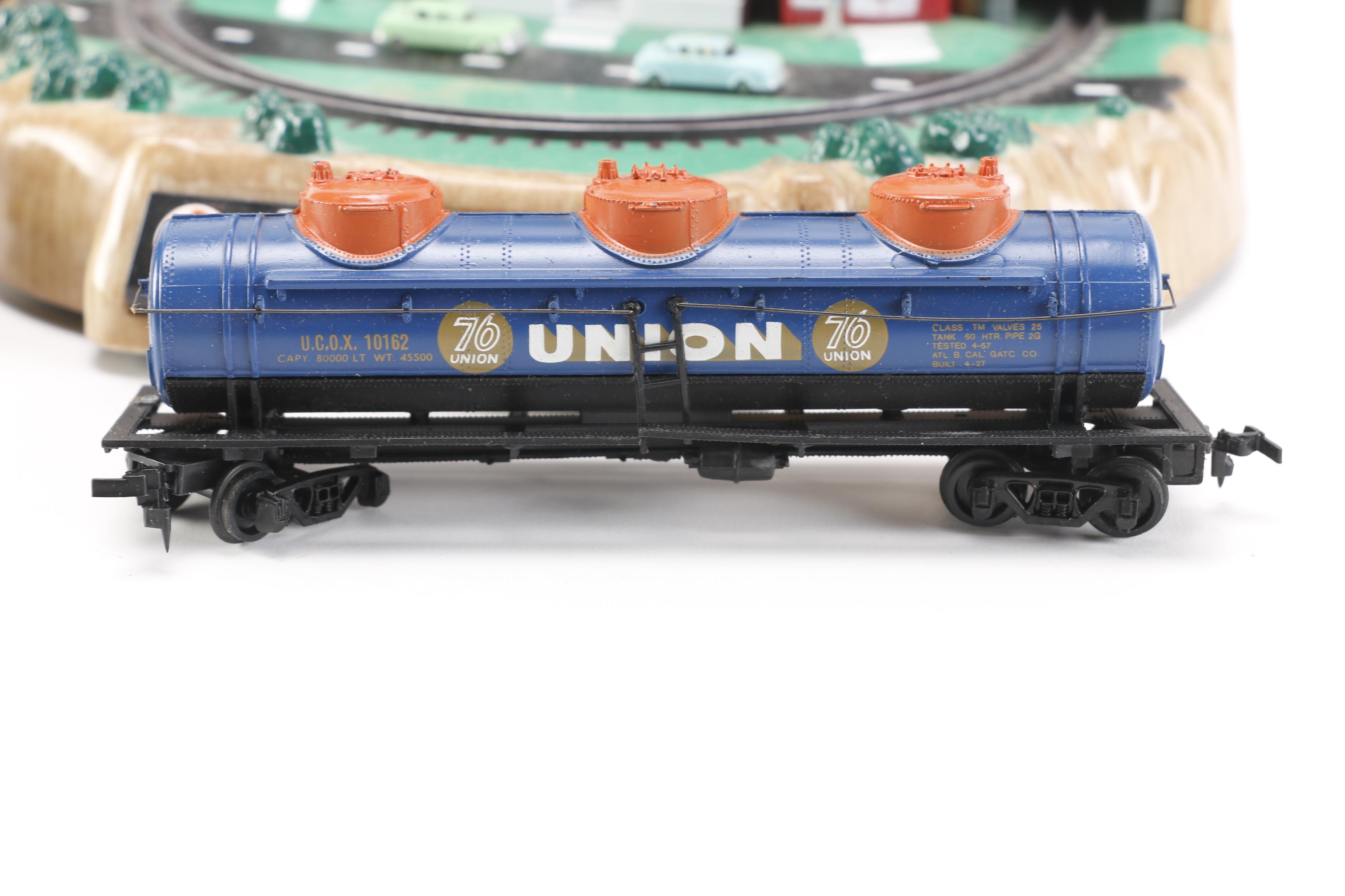 Train Cars, Track and Accessories With Lionelville Alarm Clock