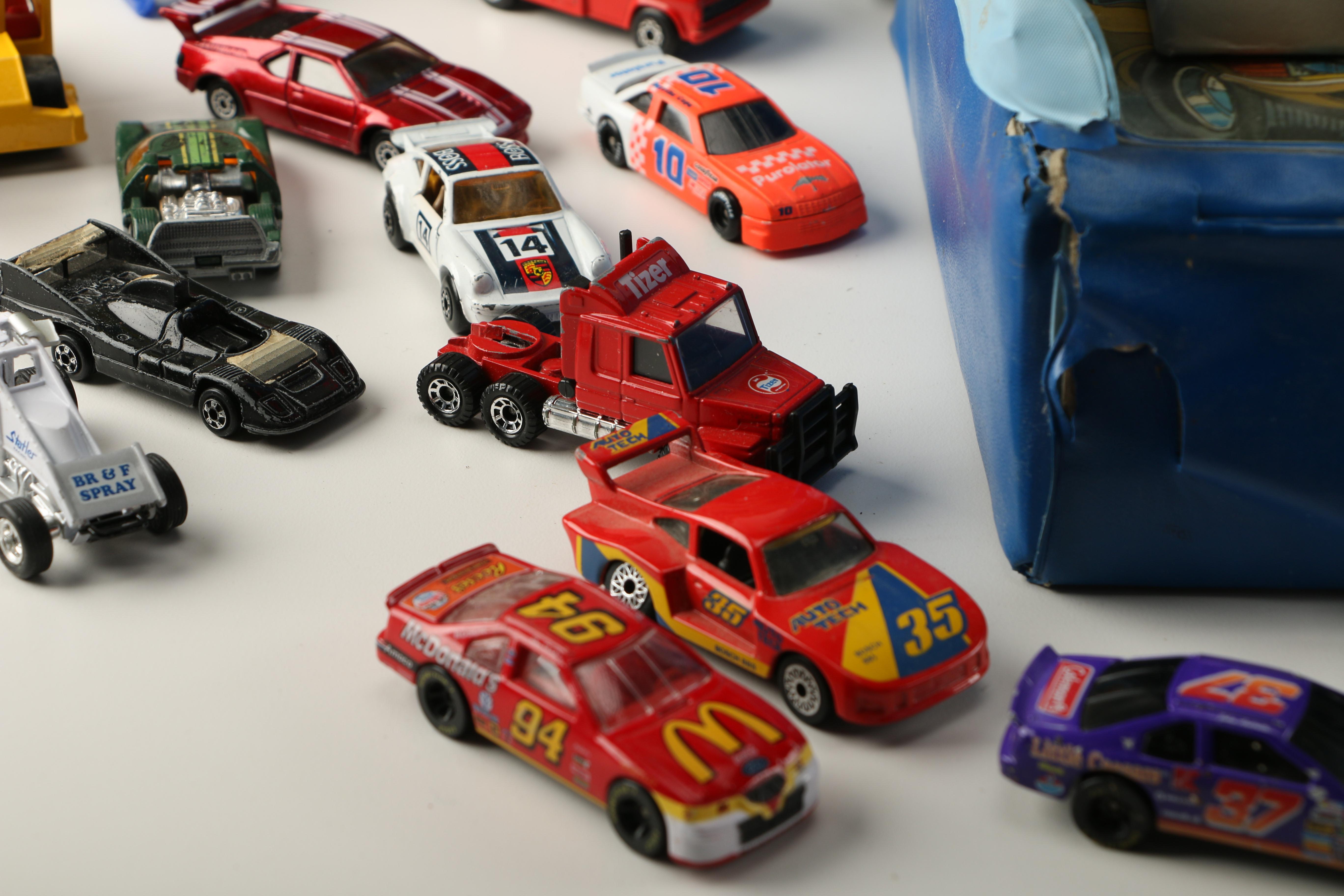 Vintage Toy Car Assortment Featuring Matchbox and Hot Wheels