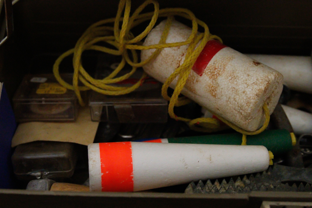 Assorted Fishing Supplies in Tackle Box