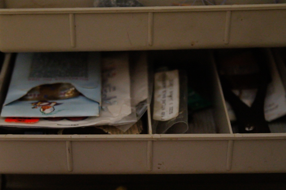 Assorted Fishing Supplies in Tackle Box